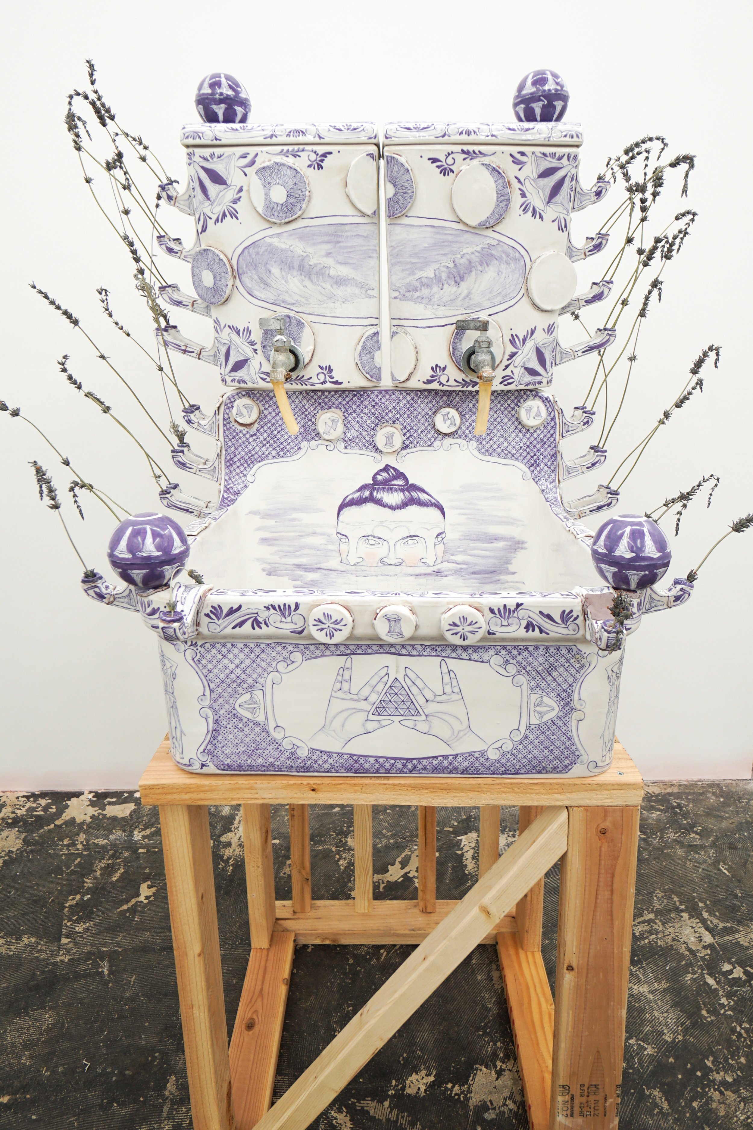  Nicki Green   Splitting/Unifying (toilet tanks, slip spigots, and medical sink laver with faucets) , 2019  Glazed vitreous china with epoxy and found slip spigots  54 x 40 x 36 inches 