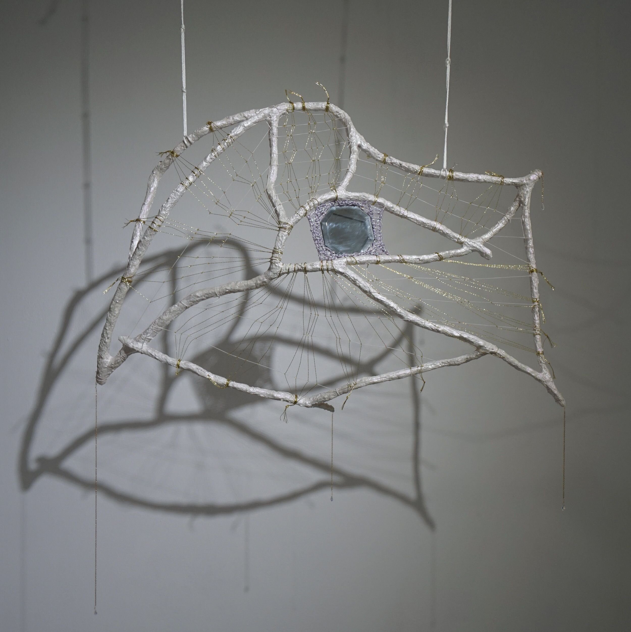  Mindy Rose Schwartz   Talisman , 2020 Branches, resin, wire, mirror, linen cord, lamé cord, crystals, wire, chain 43 x 36 x 7 in 109.2 x 91.4 x 17.8 cm 