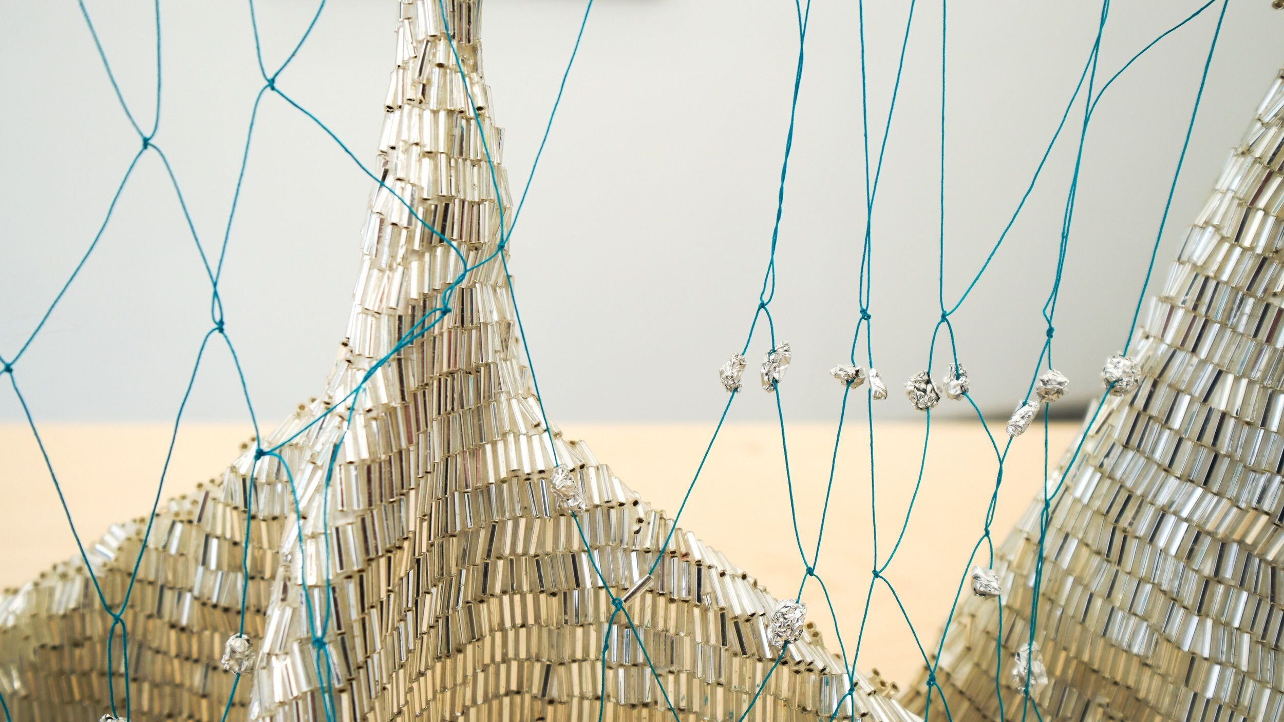  Renée Gertler  We walked together side by side , 2019-2021 (detail) Paper mache, wood, plaster, crystal beads, foil, string 