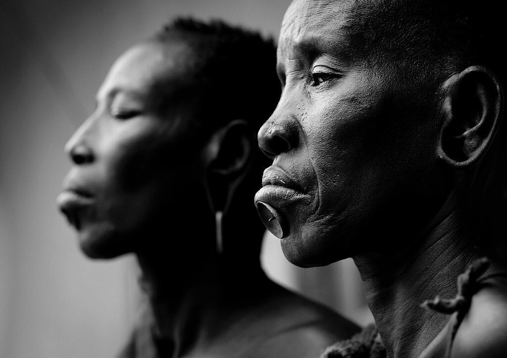 Bodi tribe women with labrets - Omo Ethiopia 
Bodi and Mursi are close tribes. But Mursi women cannot wear the giant lip plate or labret the Mursi ones have. Some Bodi tribe women have a little labret like those ones.
 
&copy; Eric Lafforgue
www.eric