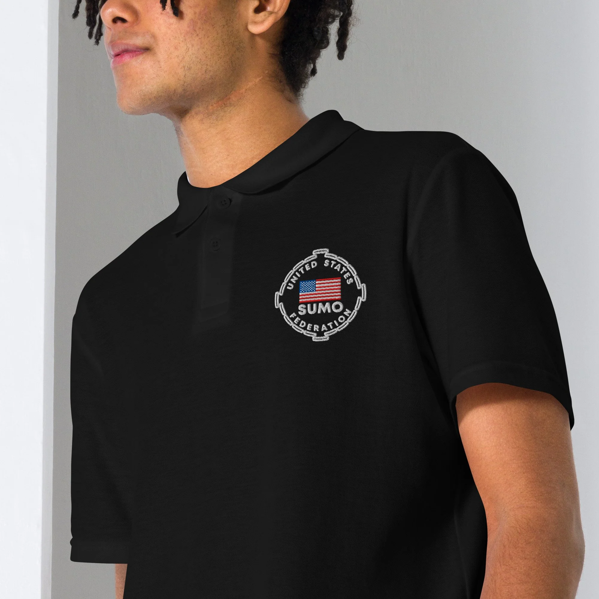 unisex-pique-polo-shirt-black-zoomed-in-68c04d50b784f.jpg