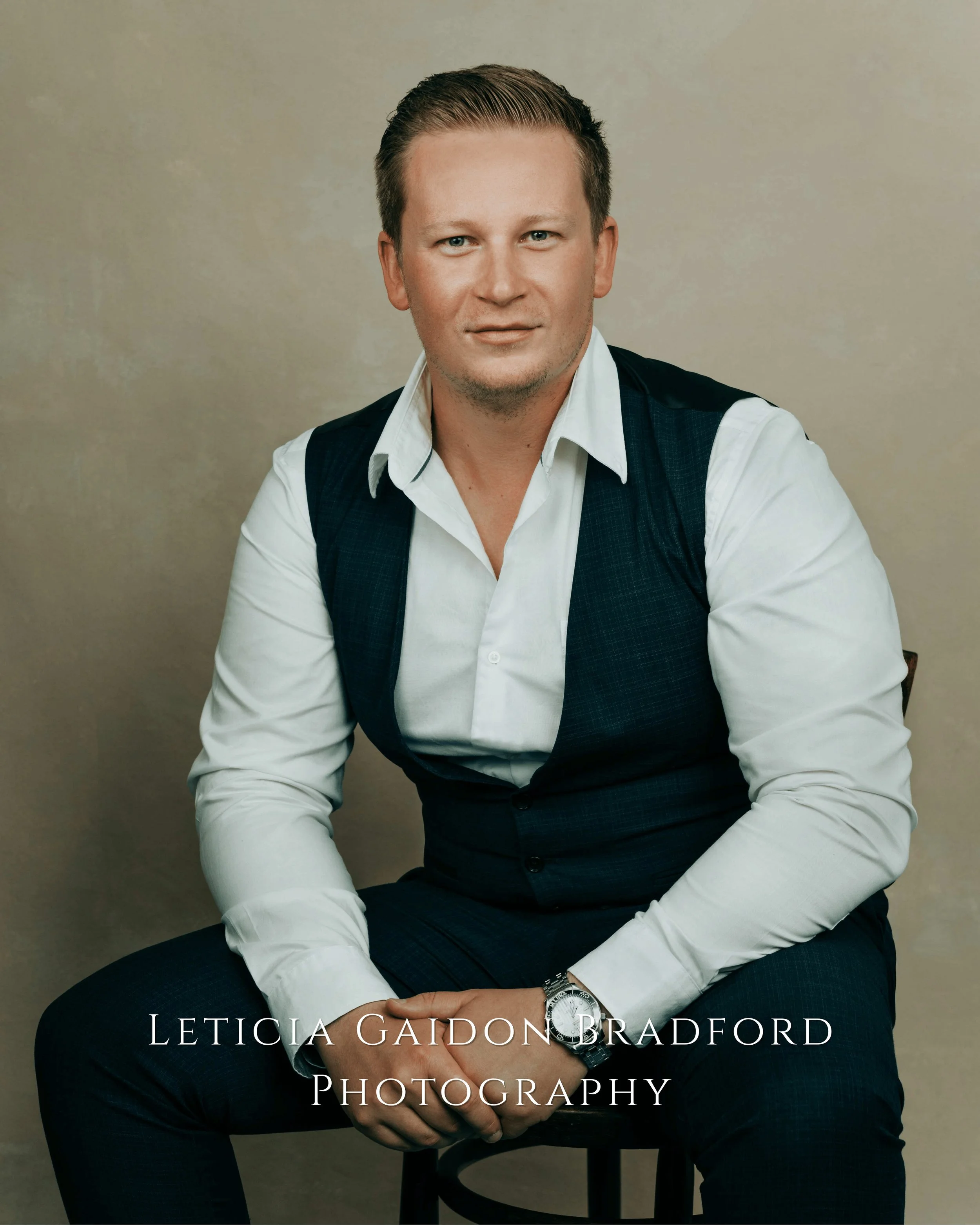 Man sitting and looking at the camera. Aberdeen and Aberdeenshire photographer - Leticia Gaidon Bradford Photography - Corporate photos - Headshots - Personal Brand - Images for website - Blog