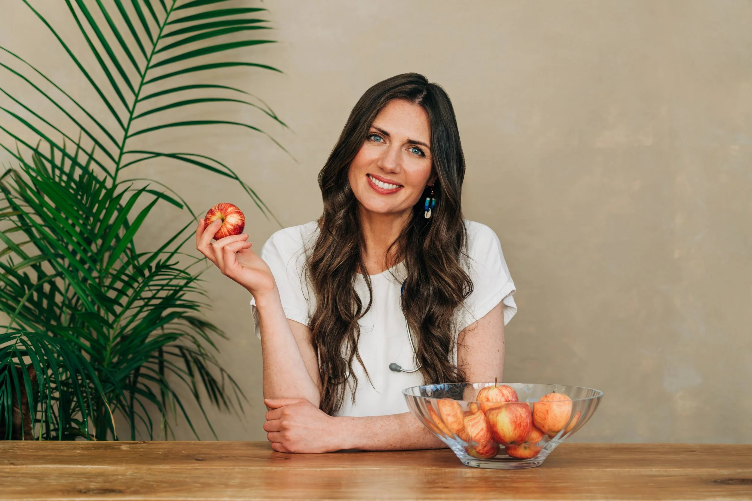 A doctor with an apple. Aberdeen and Aberdeenshire Photographer - Leticia Gaidon Bradford Photography - Personal Brand - Headshots - Corporate Photos - Blog - Dating Profile Pictures
