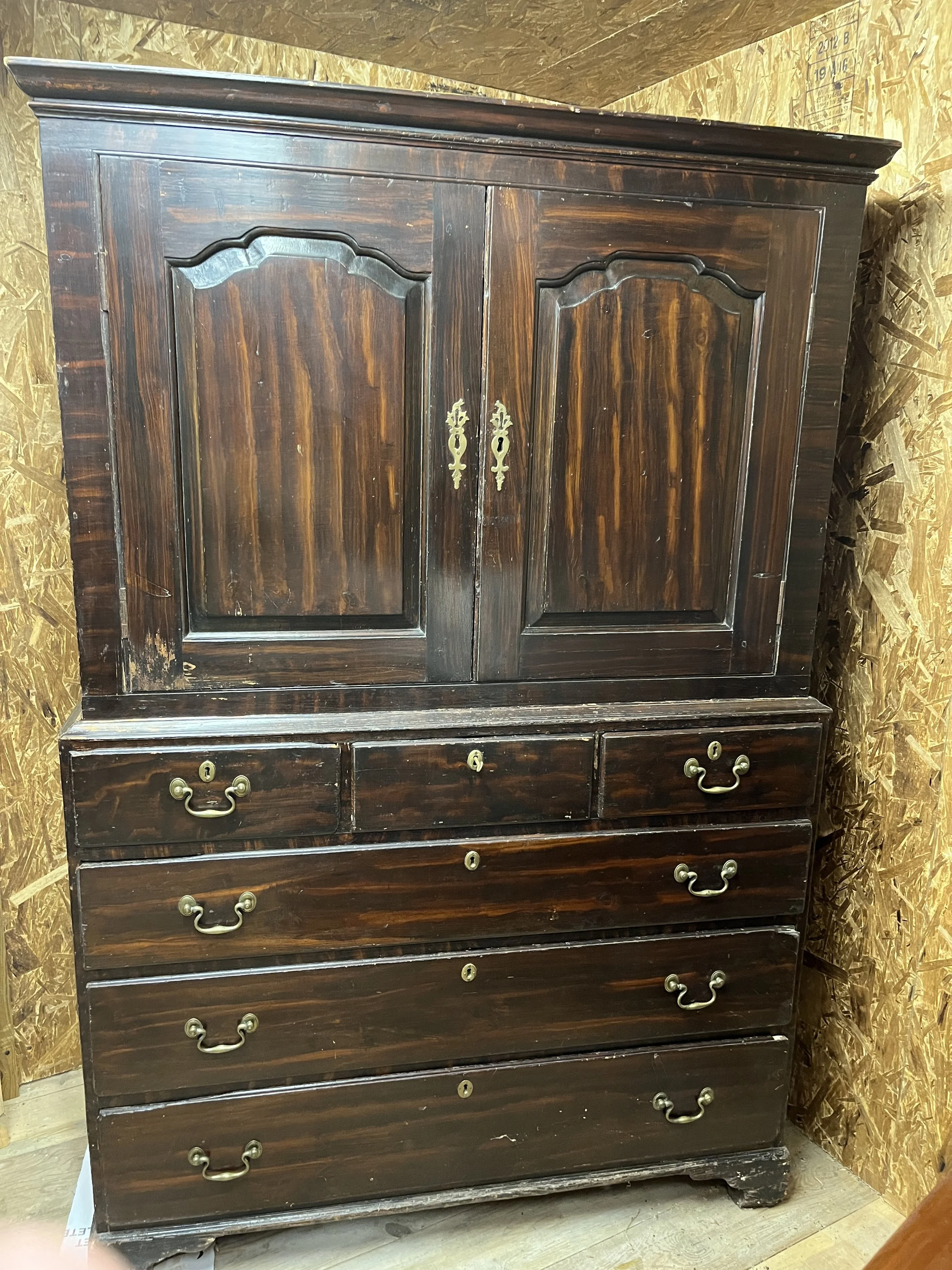  1st Quarter, 19th Century, Pennsylvania Linen Press Cupboard:  measures approx.  75 1/2” H; 50” w; 22” deep.  Grain painted.     F-52 $2,400   