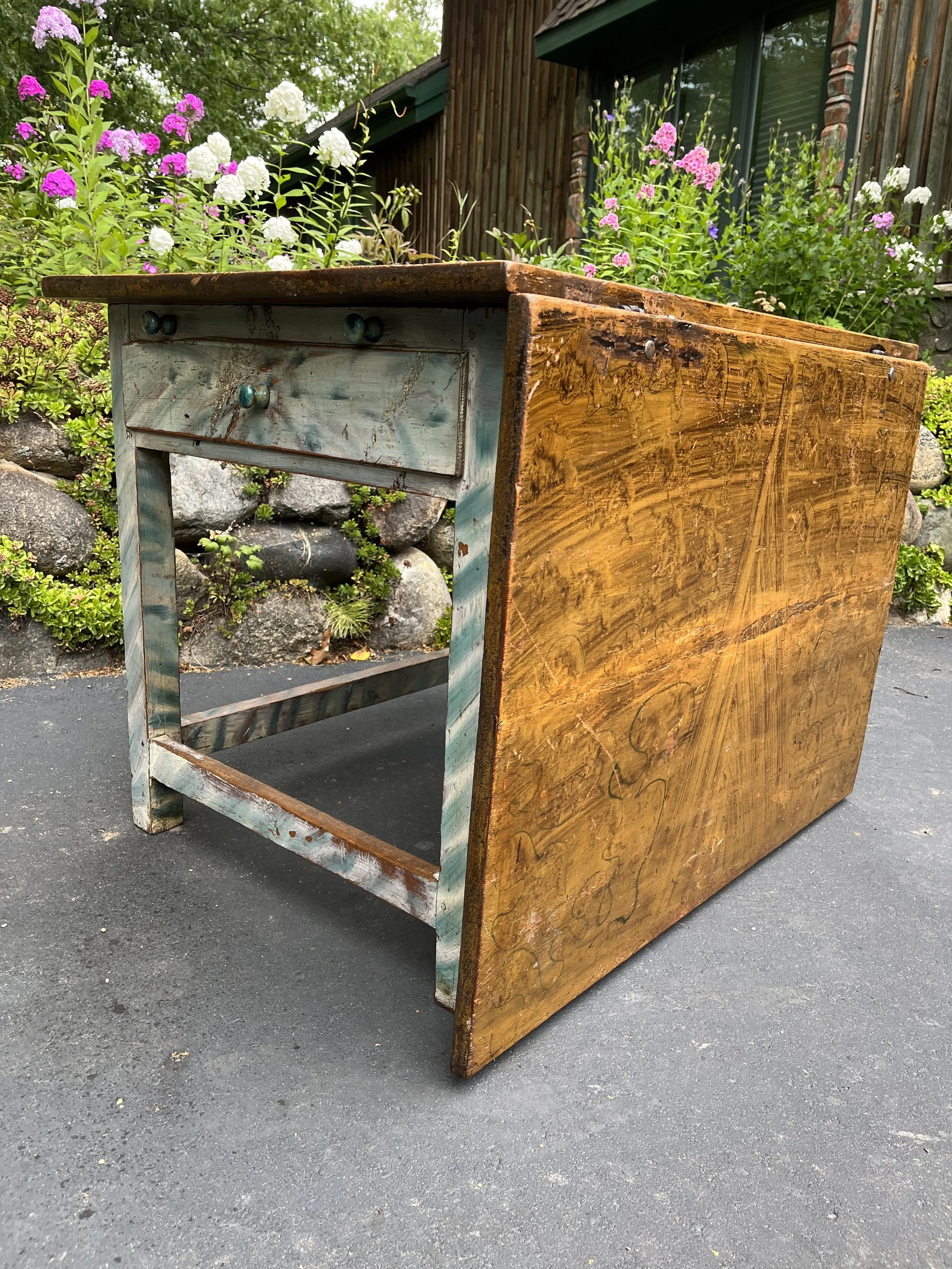  Swedish gate leg, pine, drop leaf table.  Original paint with scrubbed top; one drop leaf, 2 drawers.  29 1/2” H x 39 1/4” W x 28 1/2” L (leaf down) and 56”. L with leaf. out.     F-57  $1,300.00  