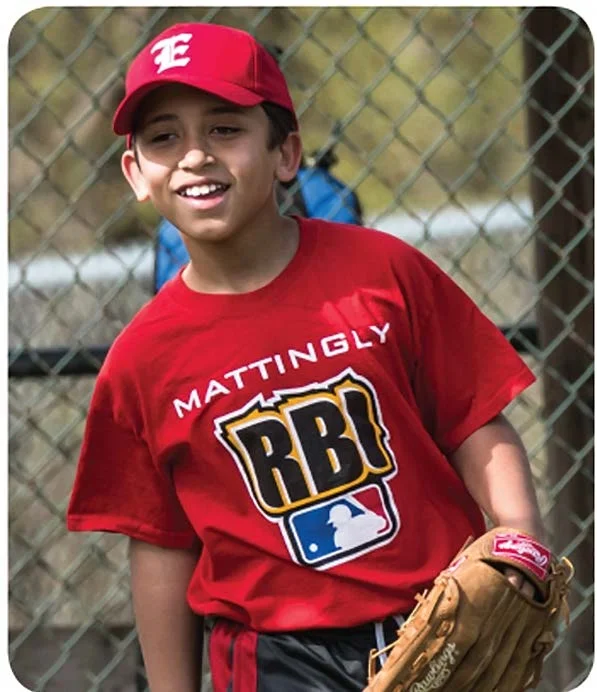 Teddy enjoys being part of a baseball team.