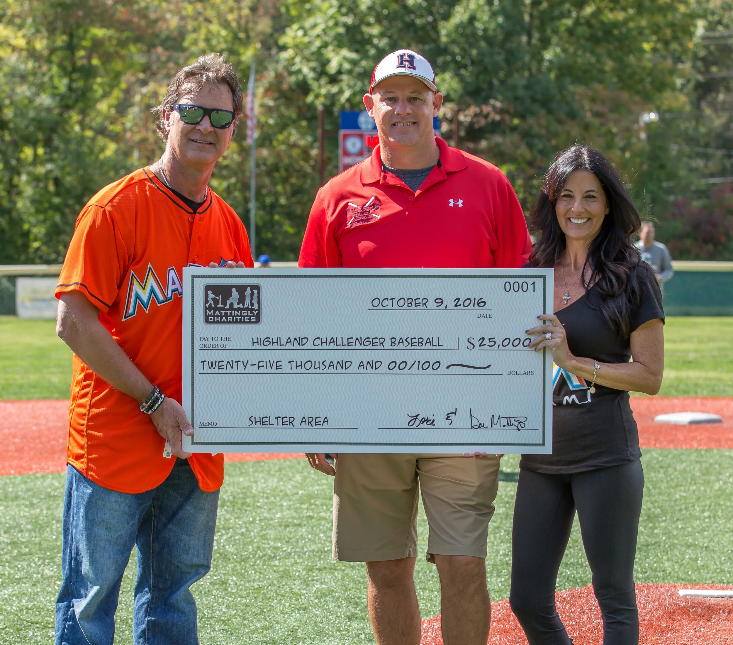 Challenger League Mattingly Charities check presentation 10-9-16.jpg