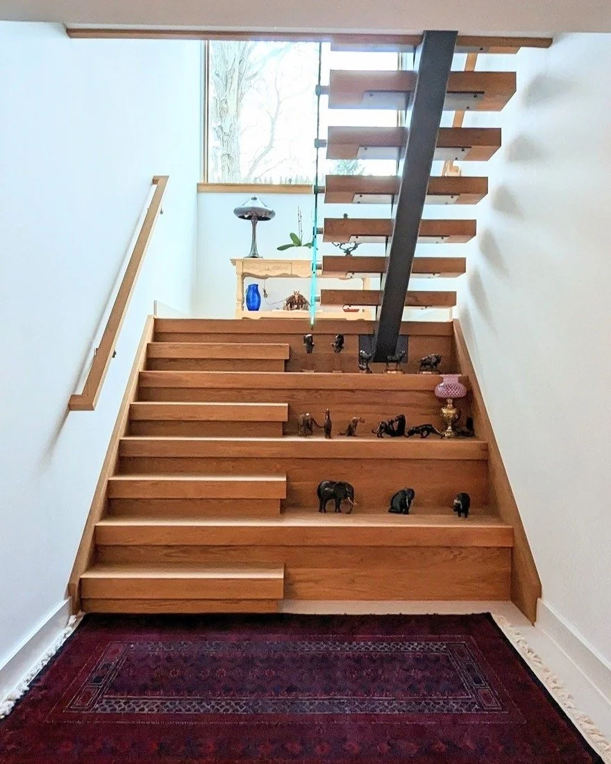 Believe it or not, this light-filled stair is in the basement.

Oriented with its windows facing south, it brings daylight deep into the lower level&mdash;creating a sense of openness and connection to the outdoors all day long.

The white oak tiered