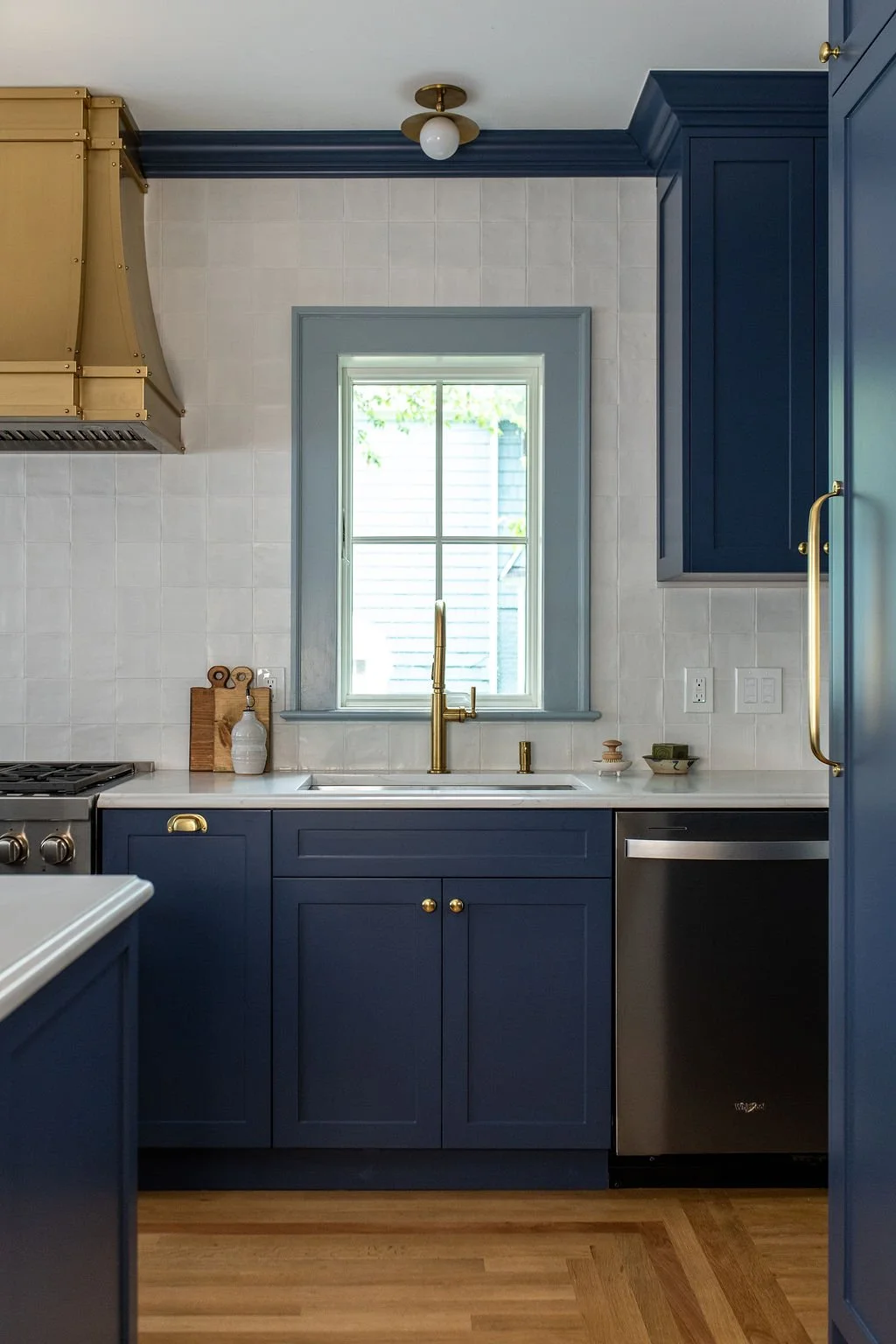  Making this kitchen feel like it had always belonged to the house, rather than like an addition, was one of the family's biggest goals for the whole project. Getting there took this same level of attention in every corner of the room. 