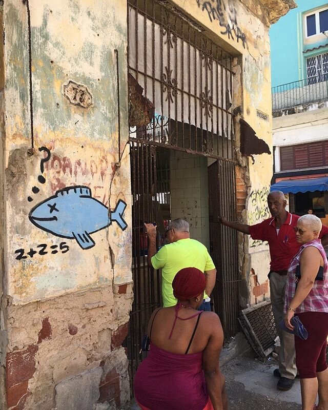 2 + 2 = 5? 
This street art addresses food rationing and shortages amongst Cubans. Street art that makes you think and sends a message is all over Cuba, and we want you to experience it! &bull;
&bull;
&bull;
#streetart #havana #cuba #art #travel #pho