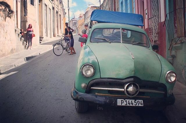 The street scene in Santiago de Cuba #travelpics #travelgram #travel #cuba #cars #classiccars #vintagecar #streetscene #santiagodecuba