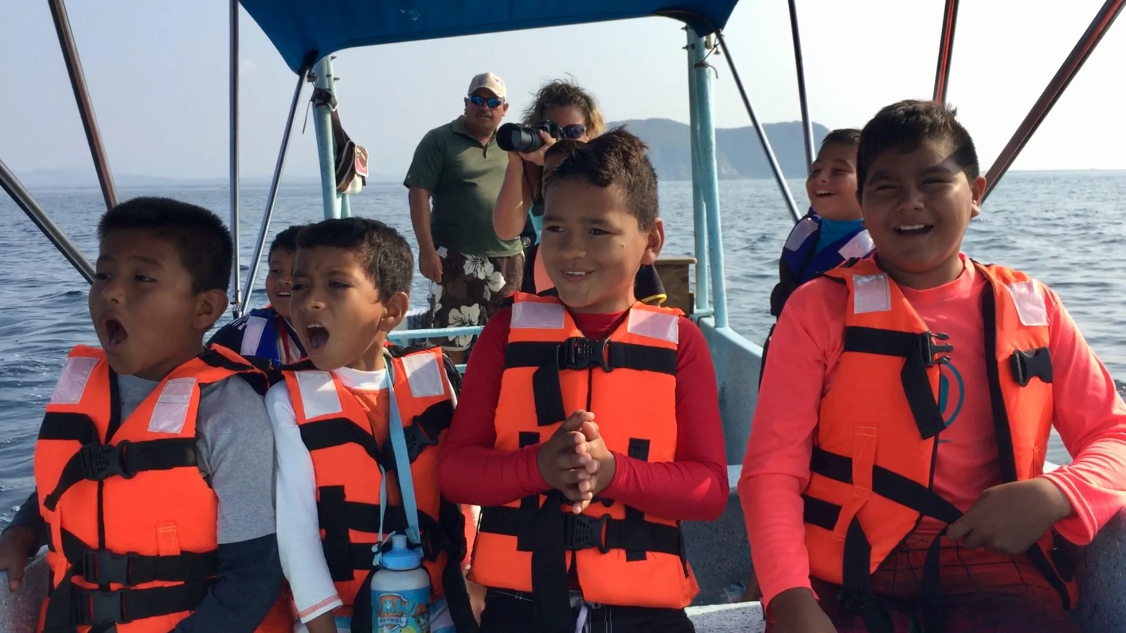 Katherina with children observing whale activity