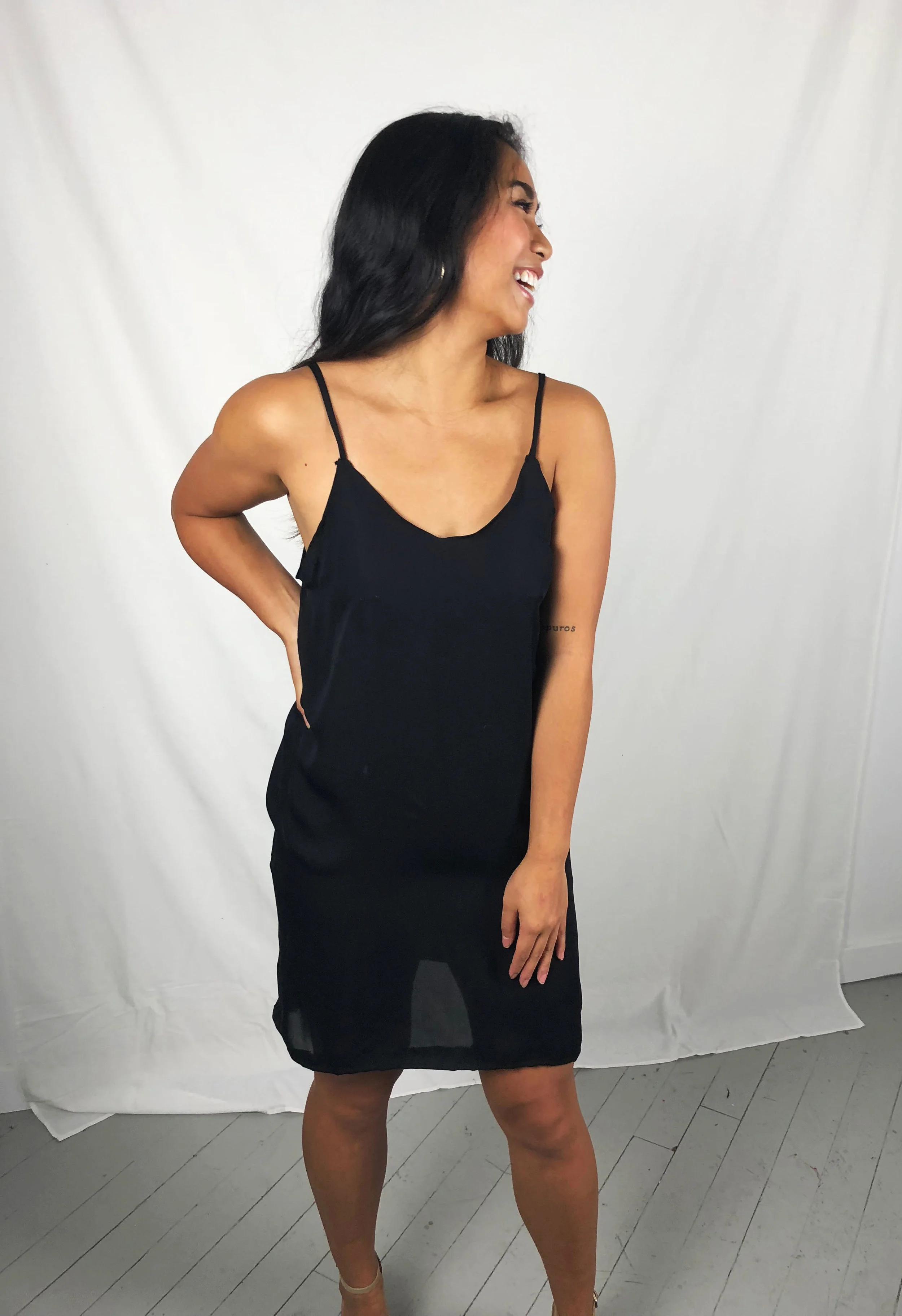 excess black silk midi dress fun angle.jpg