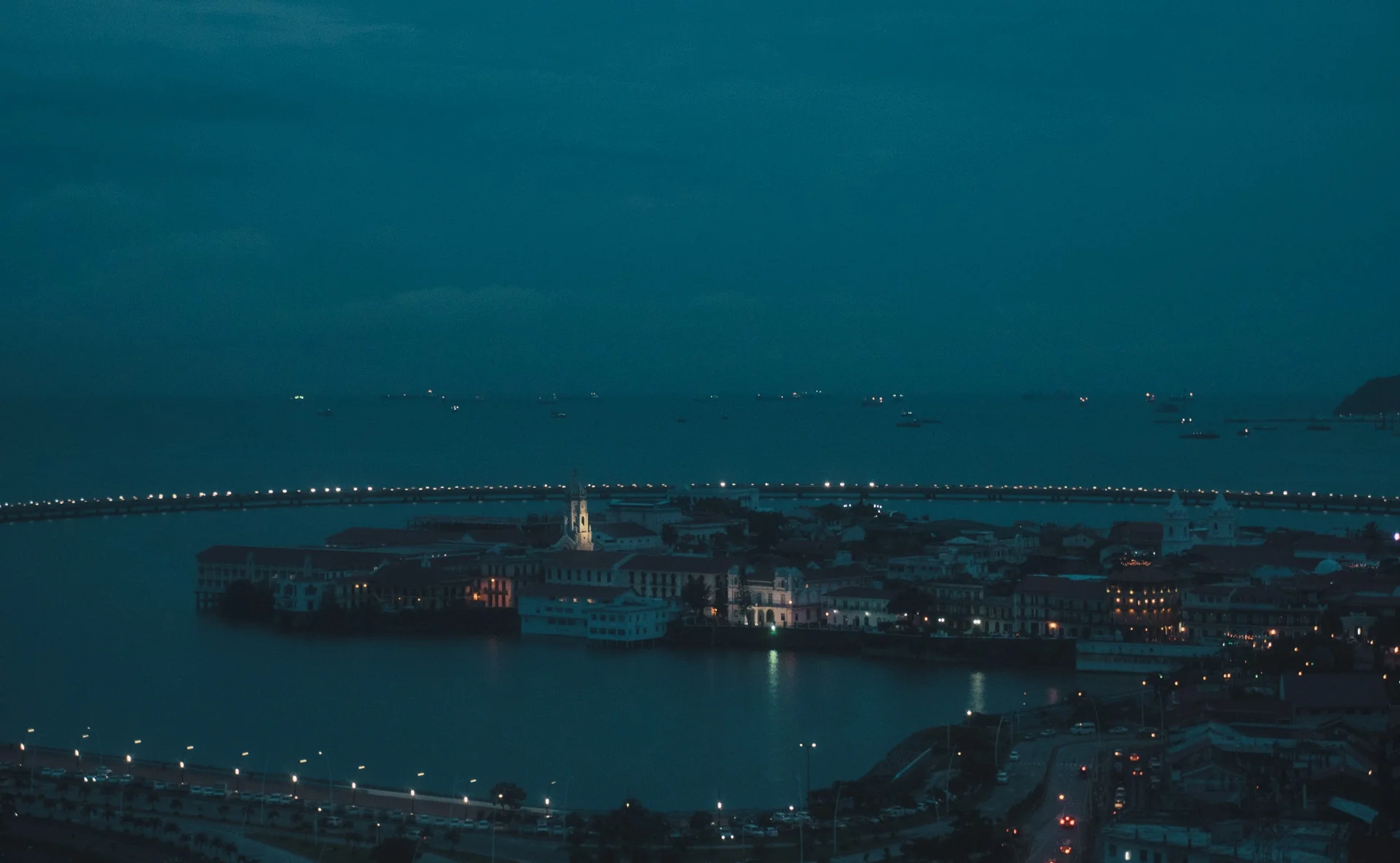 View over Casco Viejo, the historic quarter of Panama City. In the background the ships waiting to cross the Panama Canal.