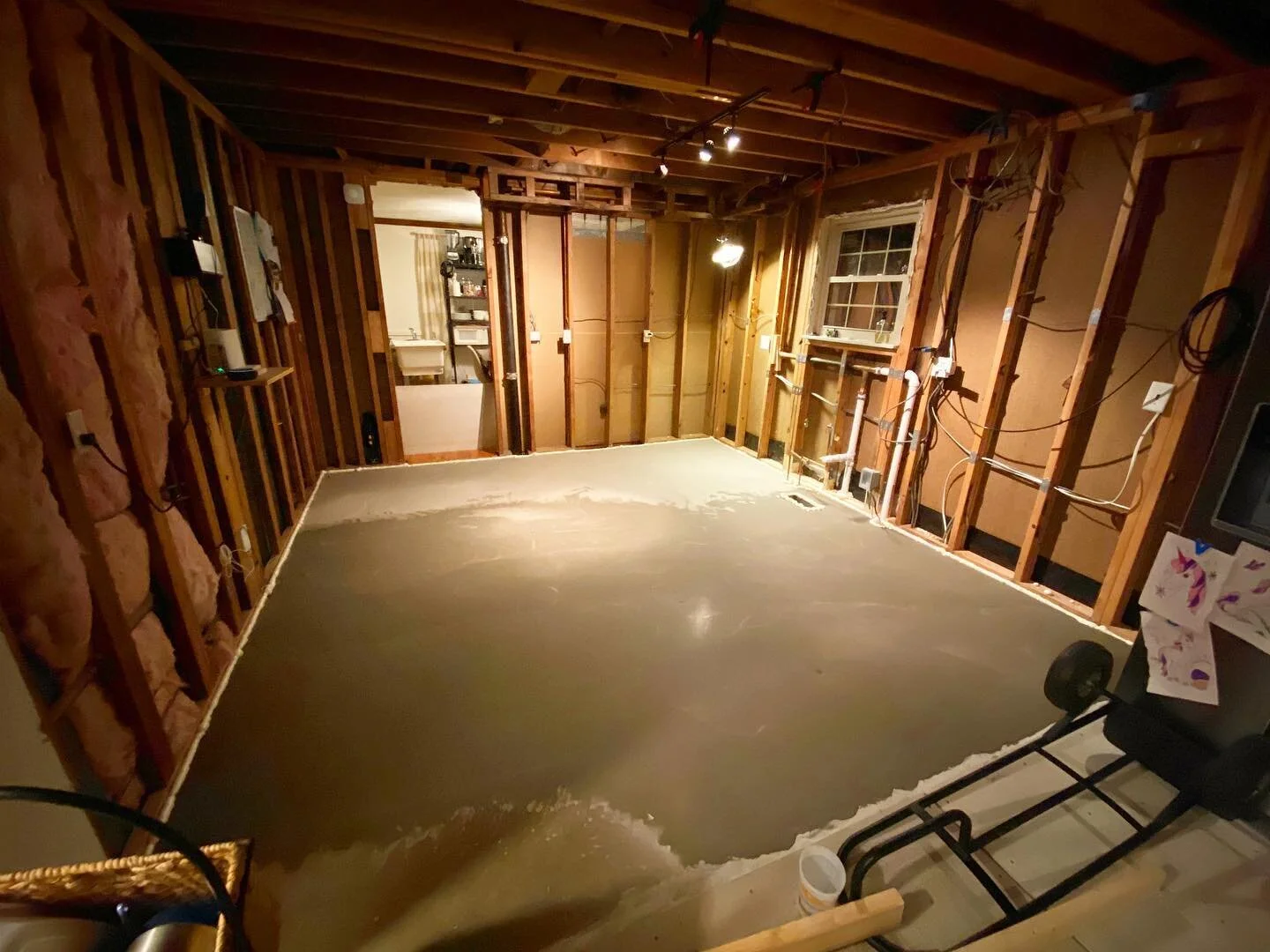 7 bags of concrete later!! WOW! Backiotomy on deck! #diy #homerenovation #floorleveling