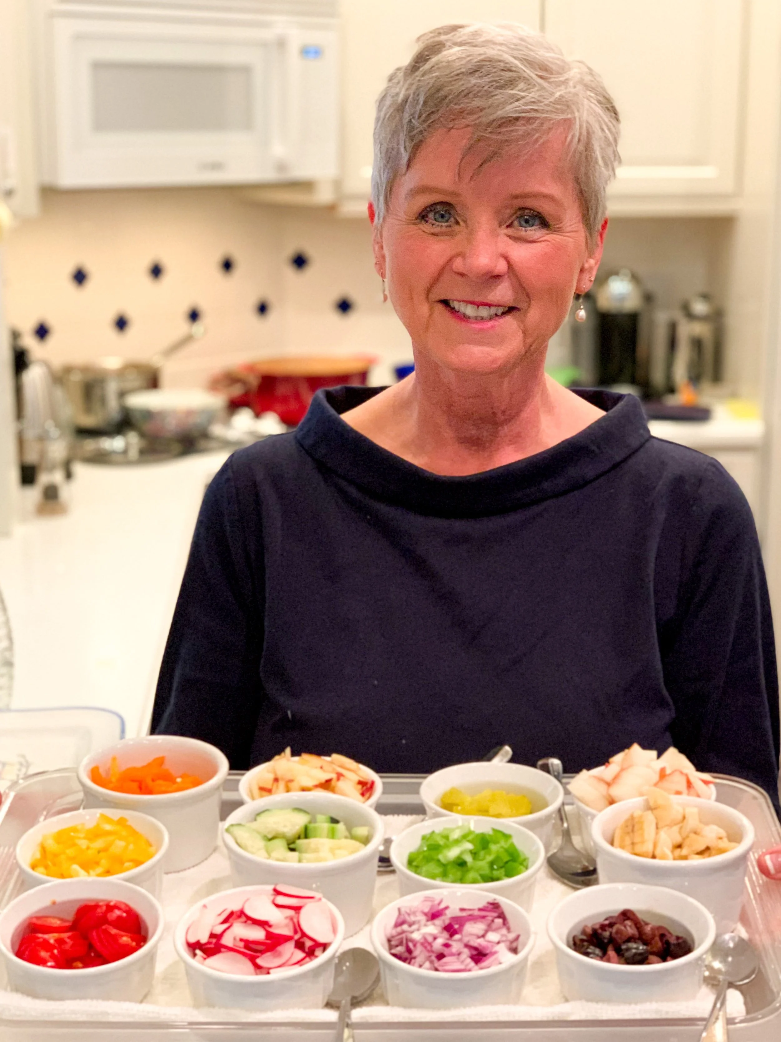 Auntie Linda brings our feast to the table