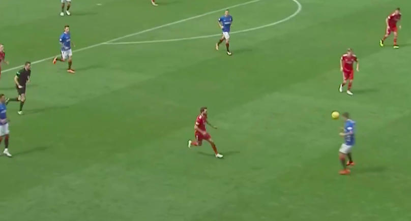 Jack has completed the pass, the ball has exited the defensive third & the Rangers player should be in a good position to turn & transition the ball up the pitch.
