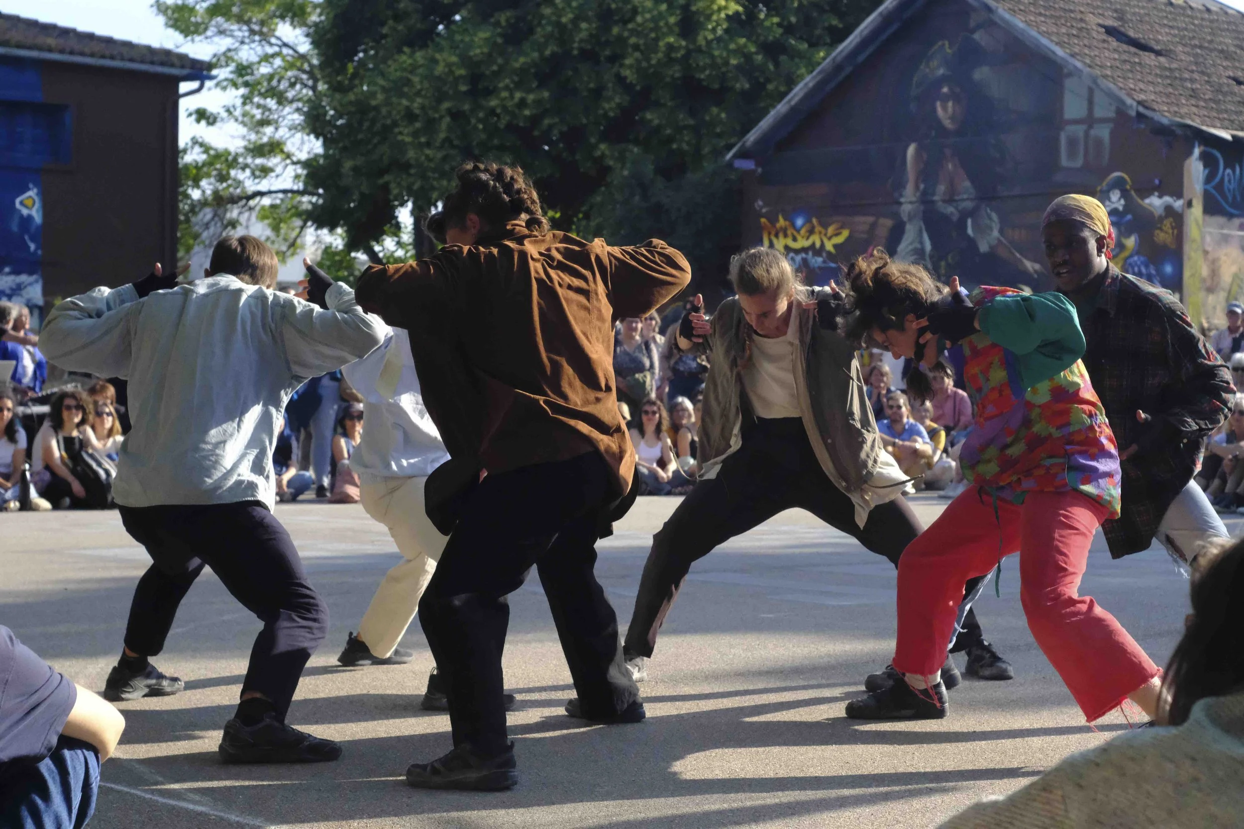 Dancers from Cie Point Bart performing Fever in the street.