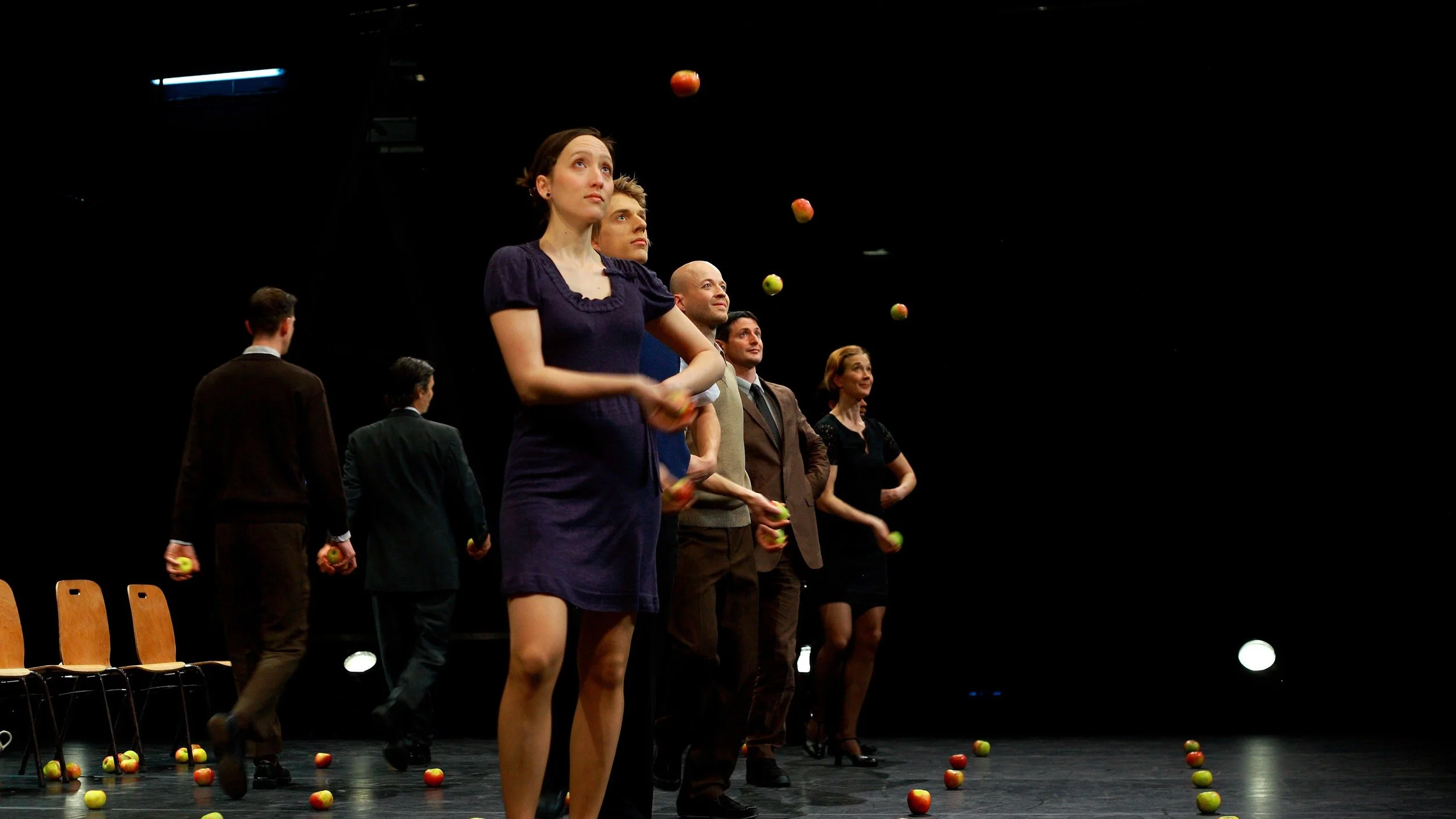 Members of Gandini Juggling performing Smashed