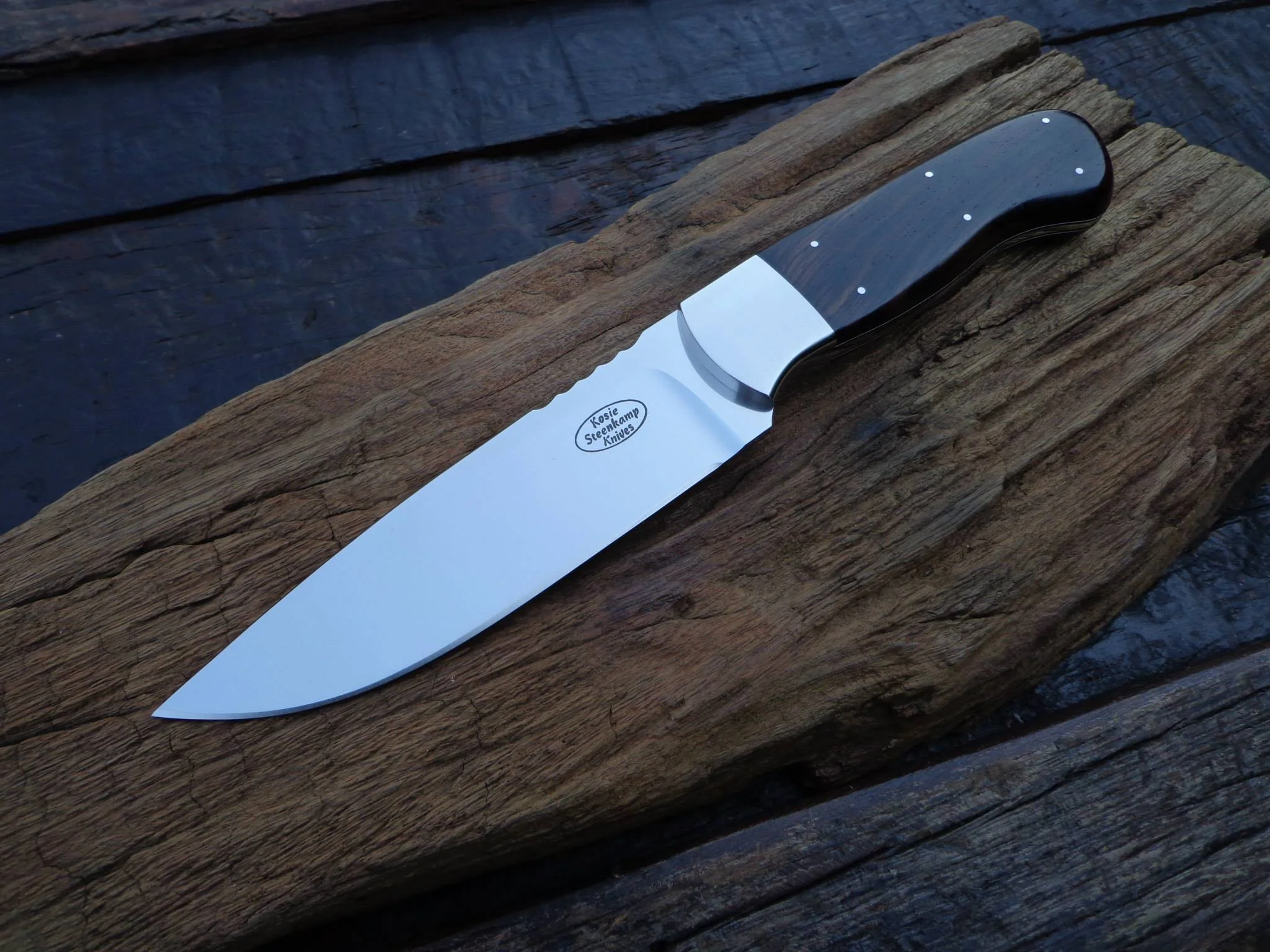 Drikas Hunter, Bohler N690 blade, 304 S/S bolster and African Blackwood handle.