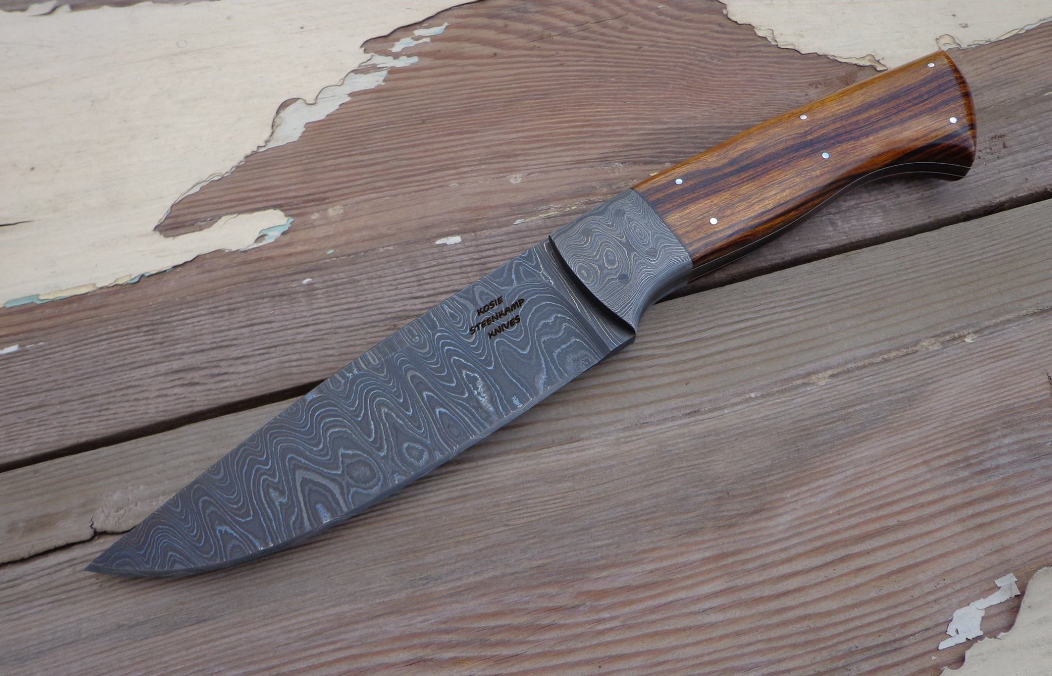 Big Hunter, Alabama Damascus blade, Alabama Damascus bolster and Arizona Desert Ironwood handle.