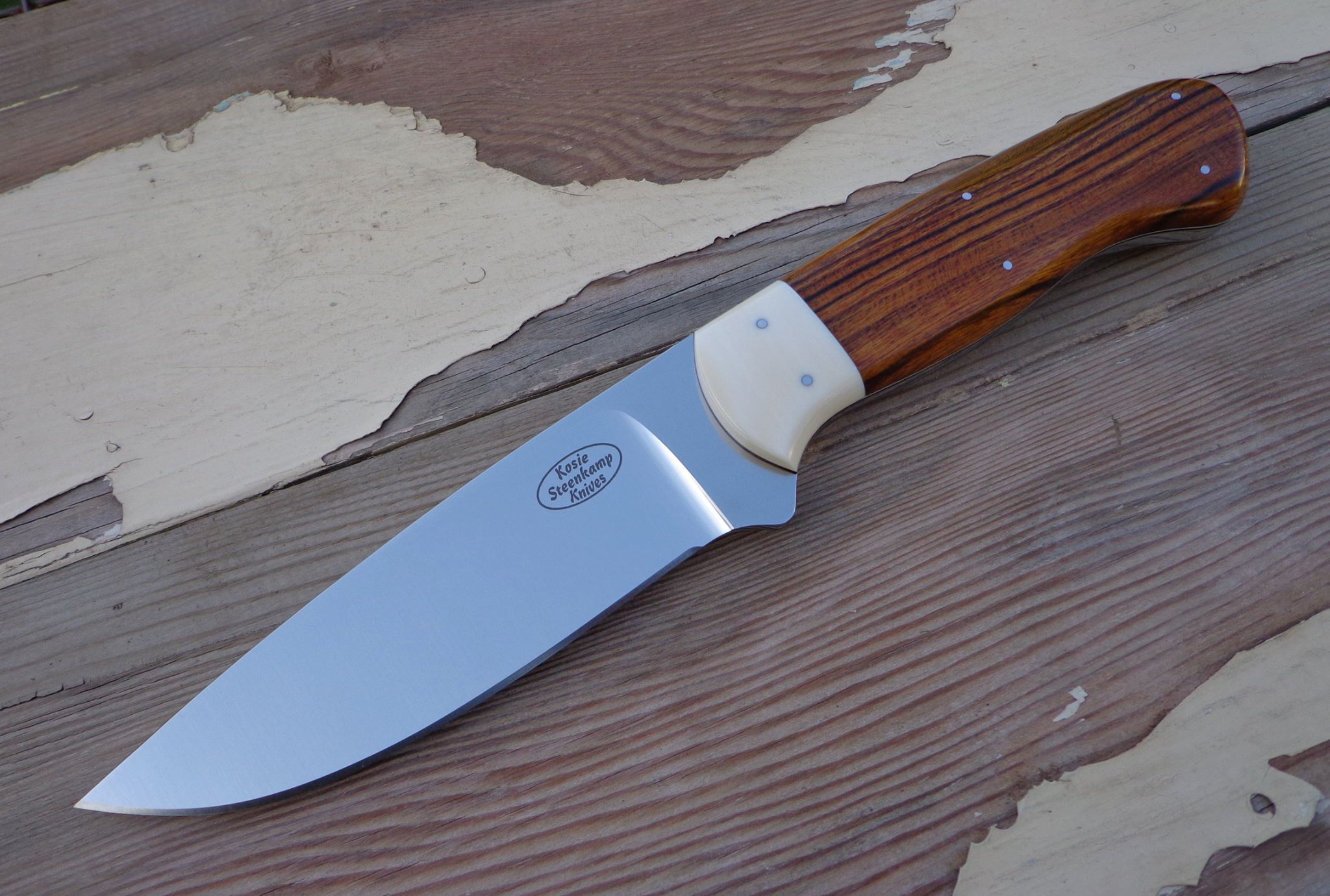 Drikas Hunter, Bohler N690 blade, Hippo tusk bolster and Arizona Desert Ironwood handle.