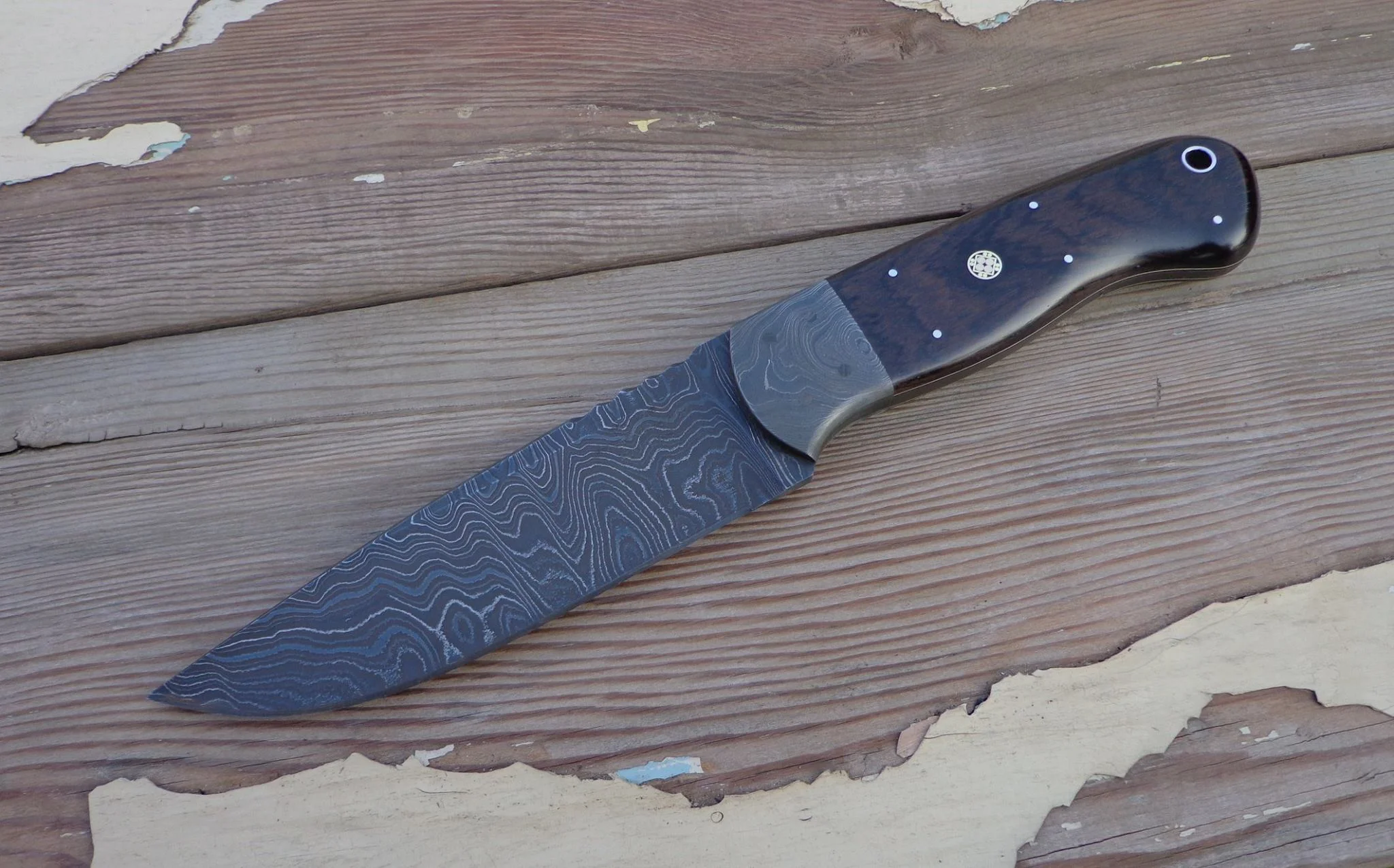 Drikas Hunter: Blade: Alabama Damascus, Coachwork: Alabama Damascus, Handle: African Blackwood with white liners.