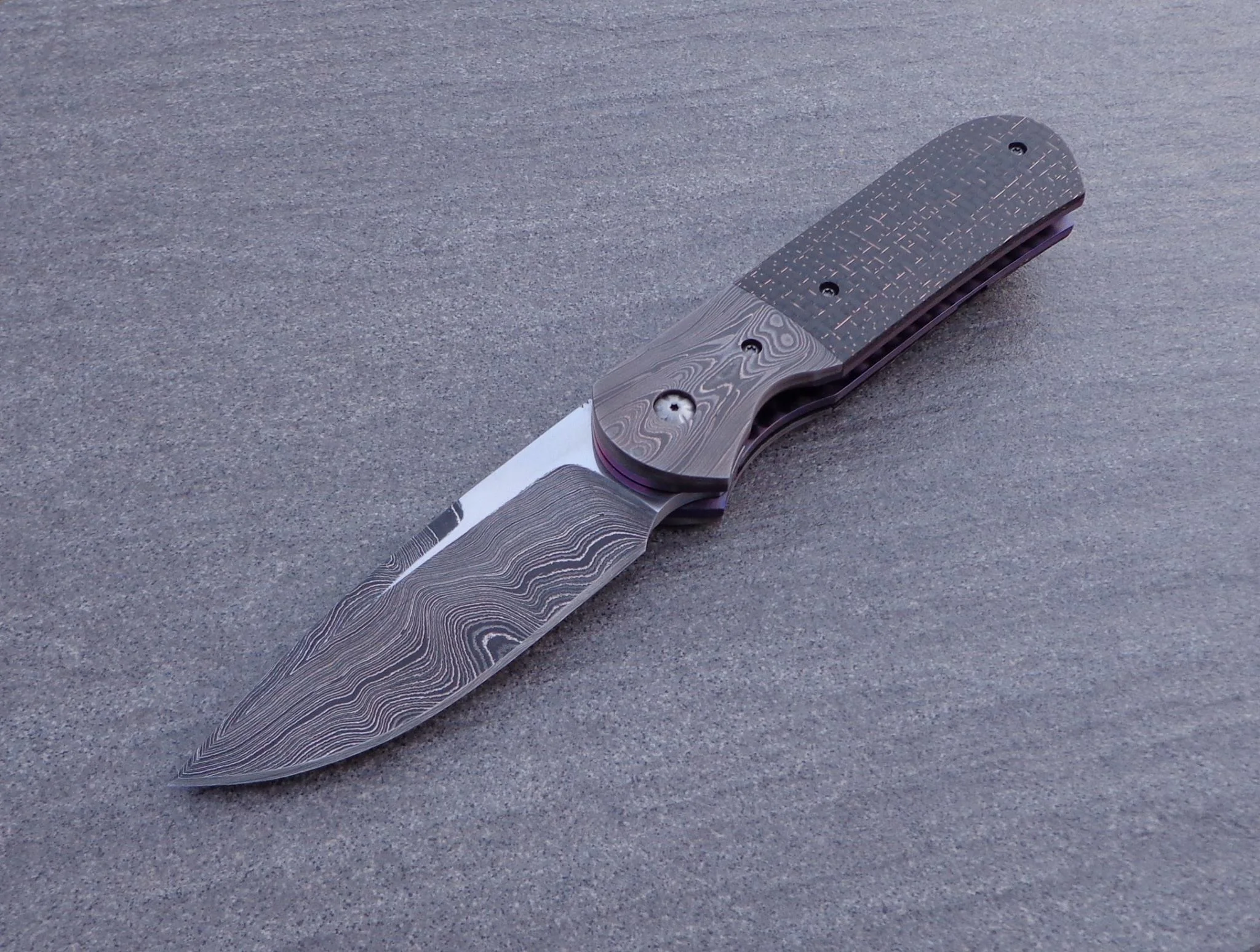 Knife: Samson Liner Lock. Alabama Damascus Blade. Titanium liners. Alabama Damascus + LSCF handle. Alabama Damascus belt clip.