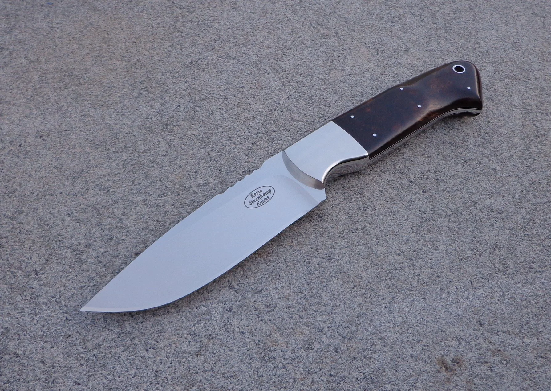 Big Hunter. Böhler N690 Stainless Steel blade. 304 Stainless Steel bolsters. African Blackwood handle slabs.