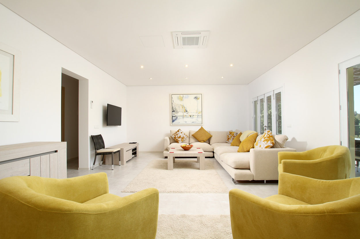 The first floor living room comfortably seats 10