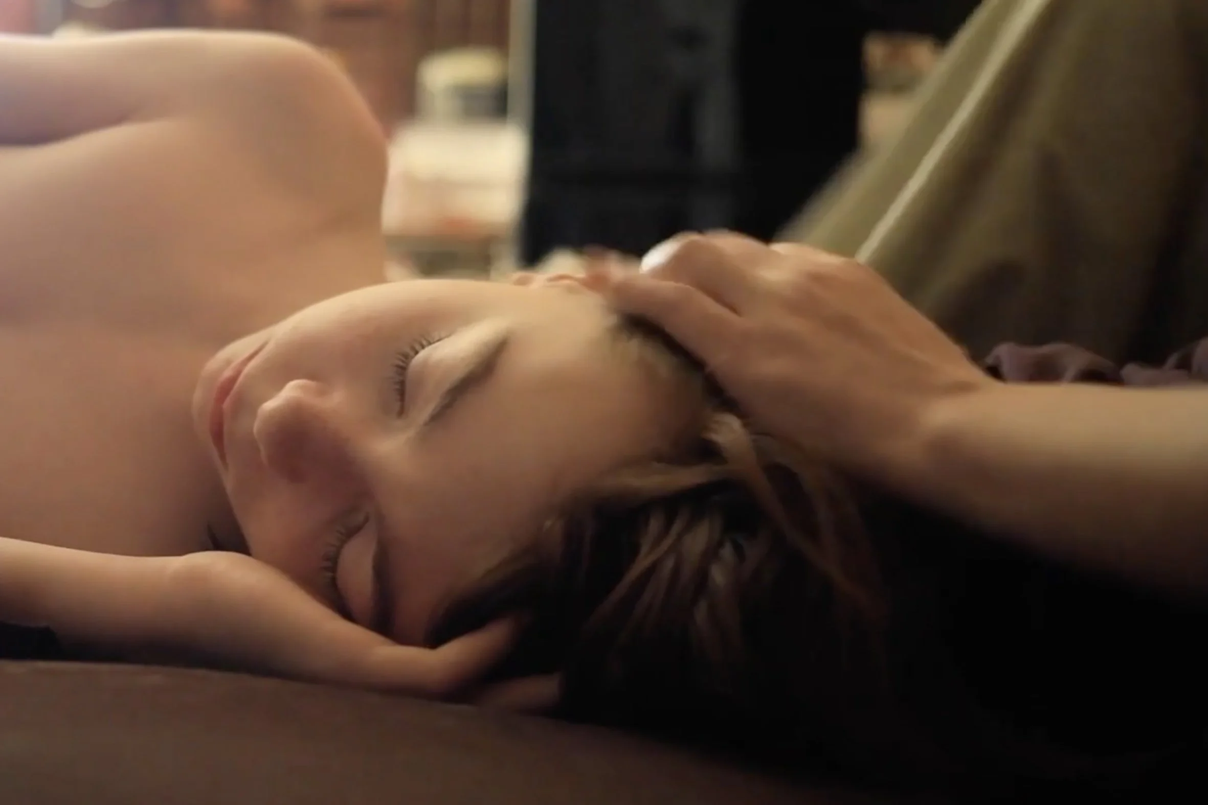 Flophouse_America_M bed mum hand.jpg