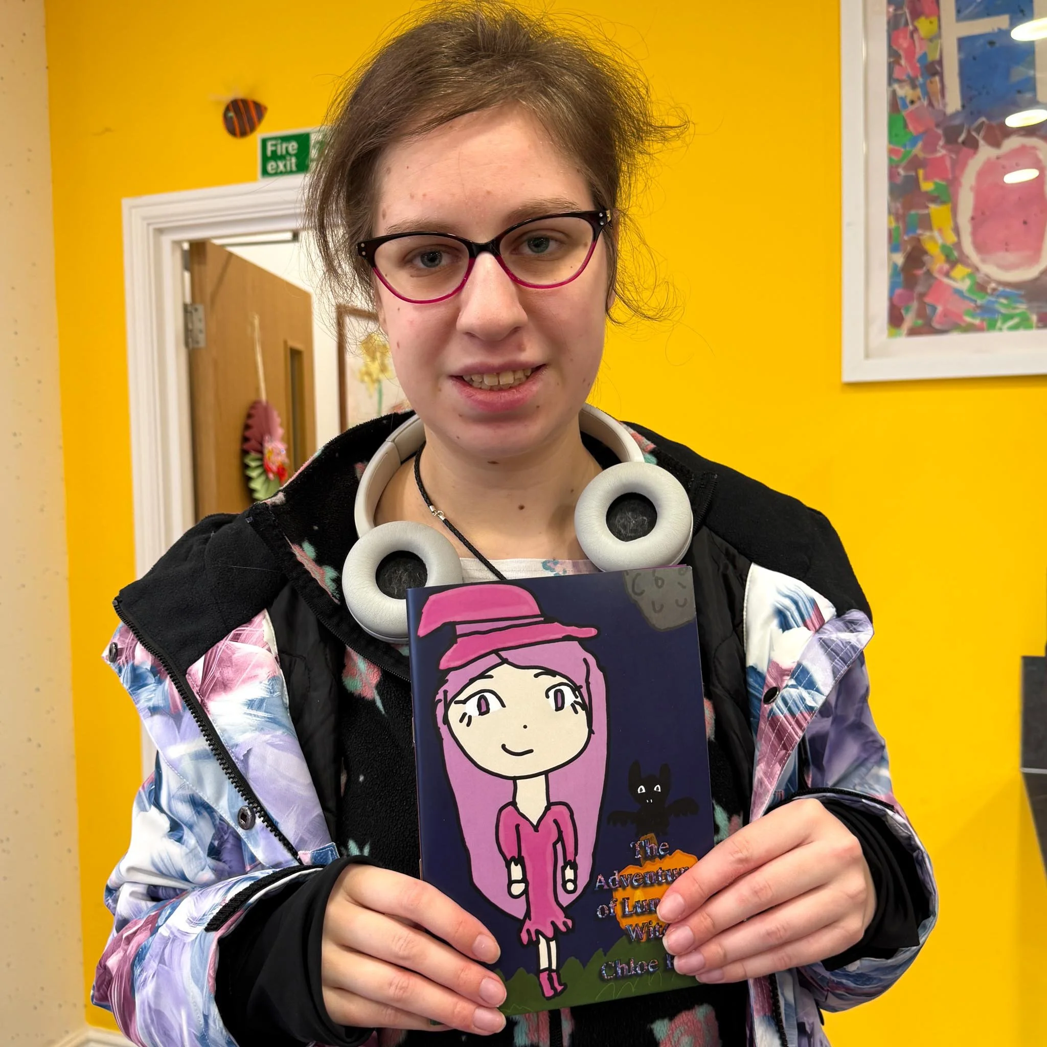 Chloe holding her magazine.jpg