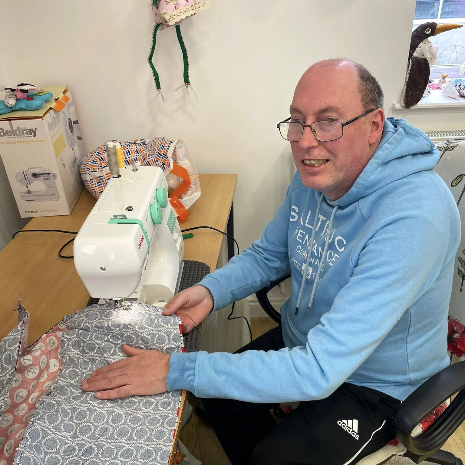 dave using the sewing machine.jpg