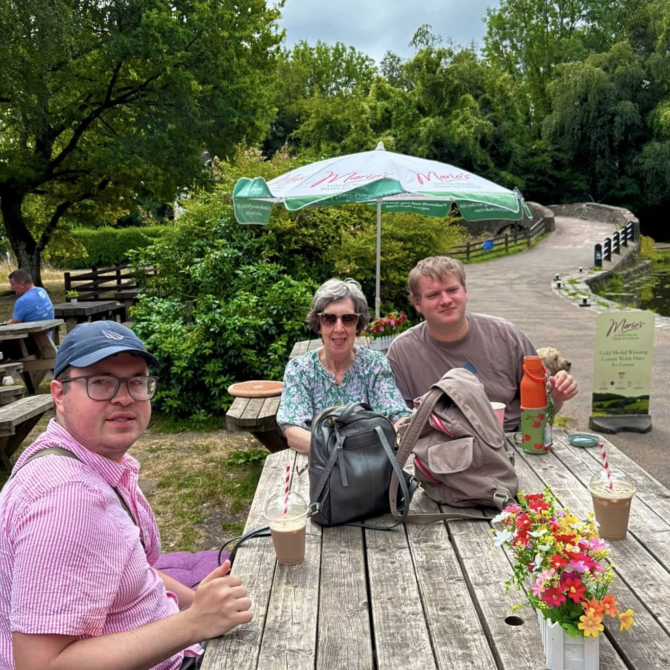 Helen Tom and Niall Having A Drink Outside.jpg