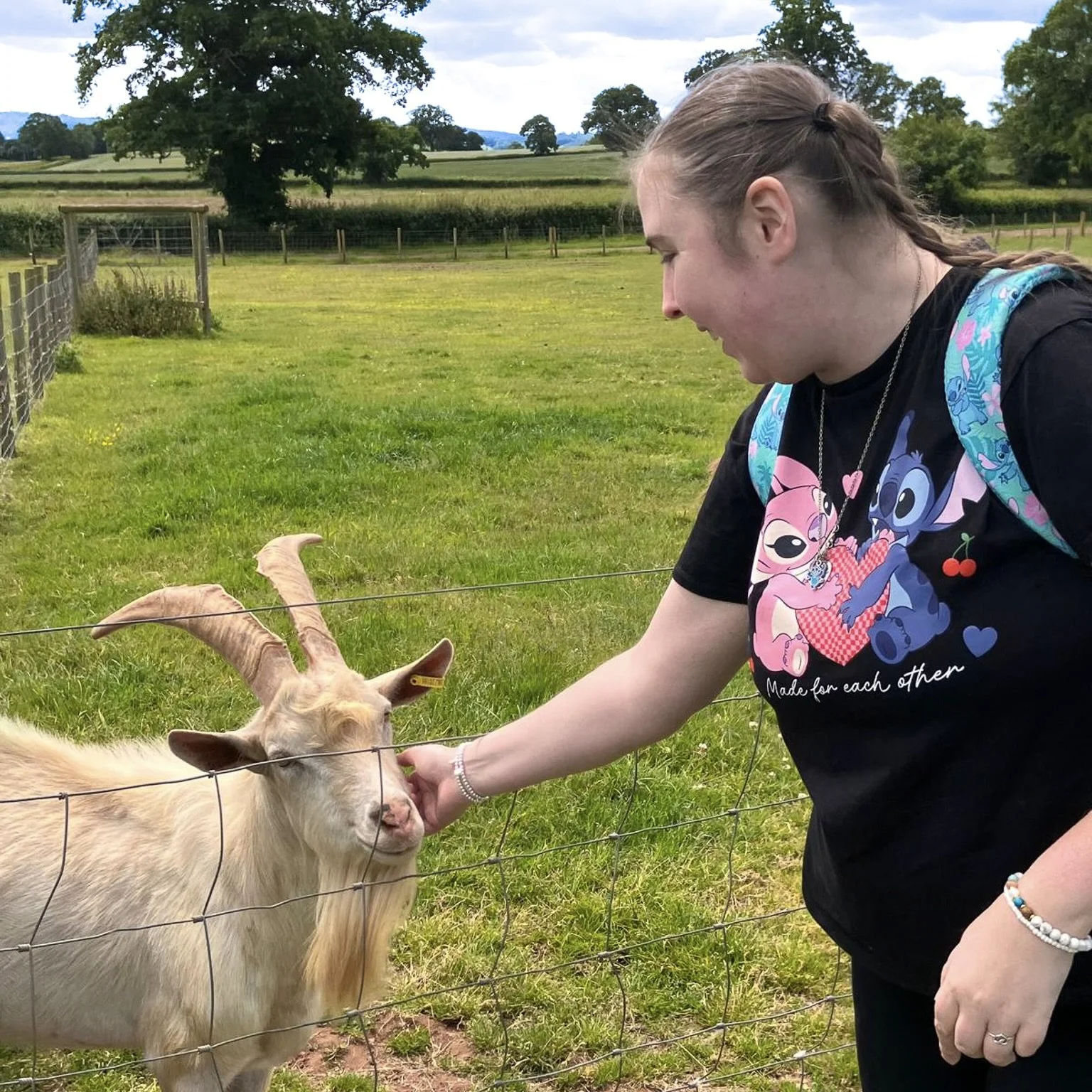 jade feeding a goat.jpg