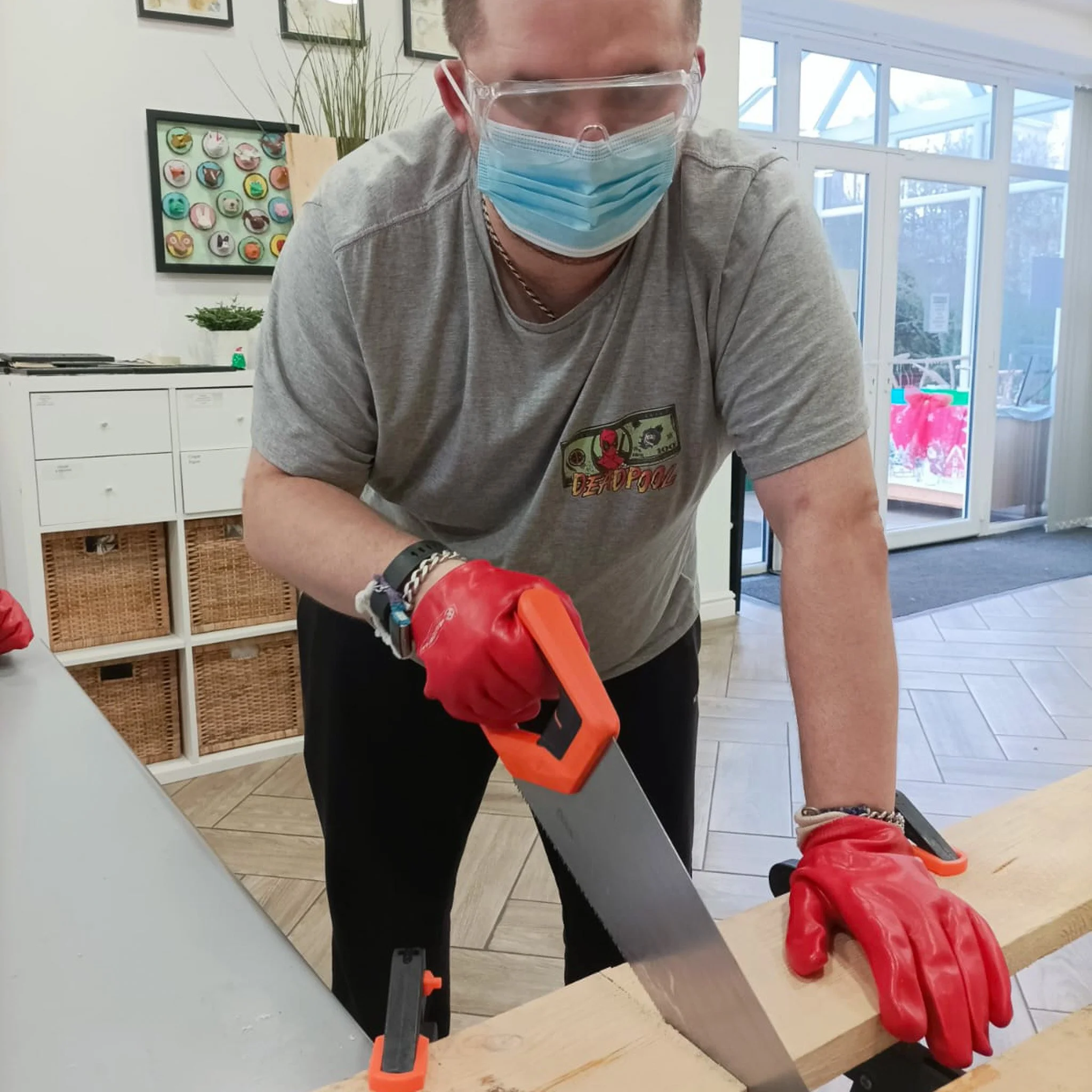 Kye Sawing.jpg