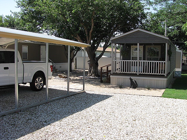 Tiny house with custom xeriscaped yard 