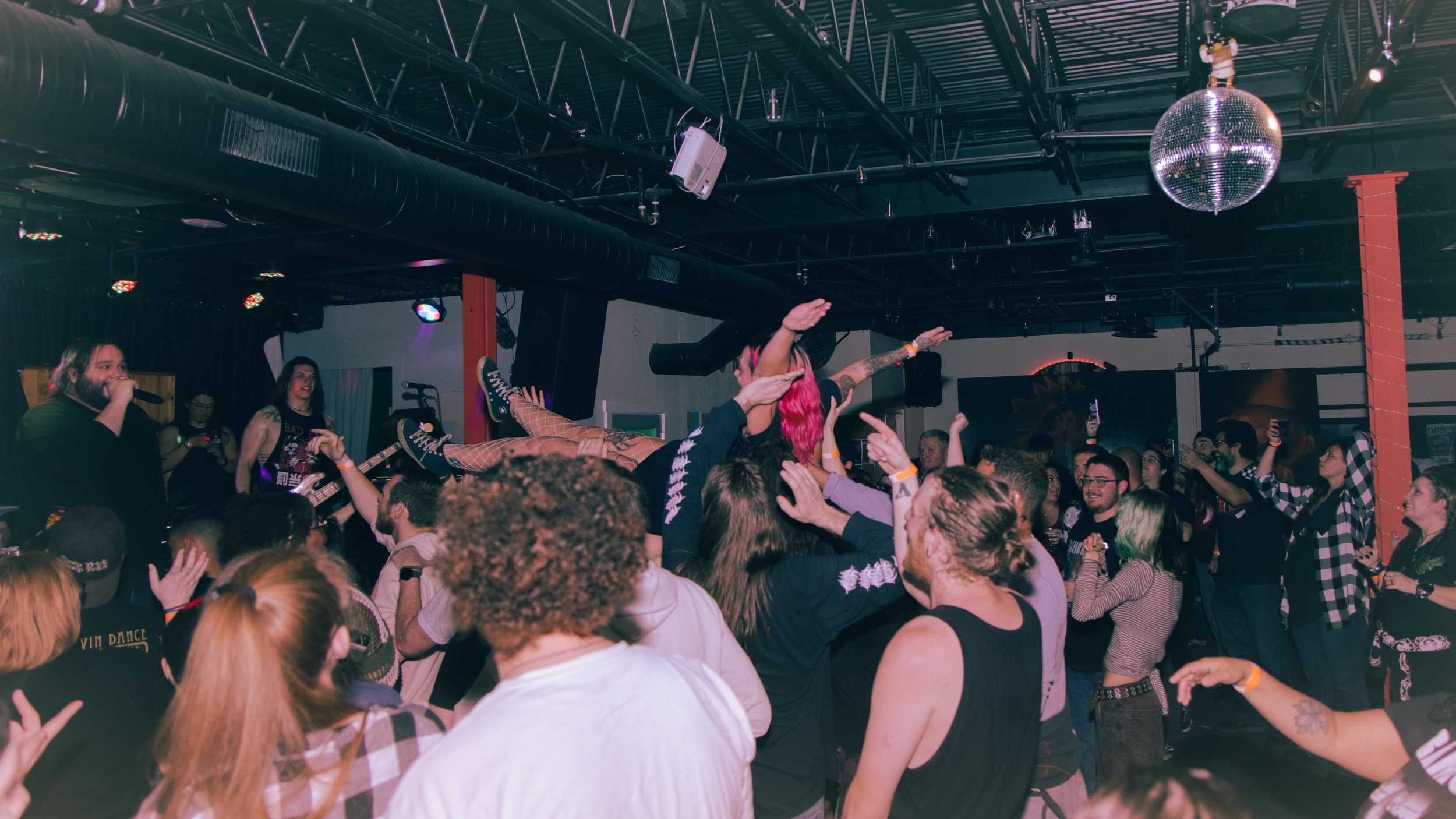crowd_surfing_singalong_live_music_archers_nerv_152_packed_show_venue_oscura_bradenton_tampa_metalcore.jpg
