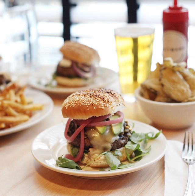 All the good things: cheese, avocado, pickled onion, lettuce.