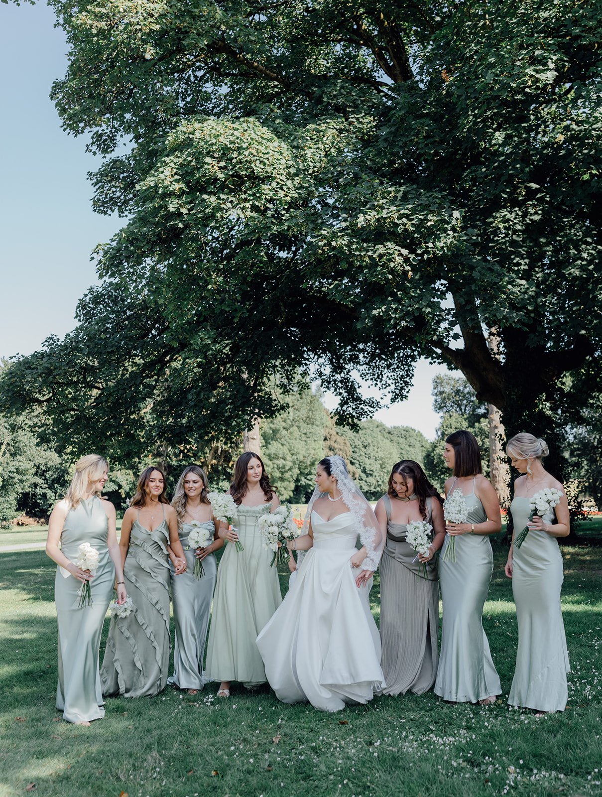 Bride with her bridesmaids in the garden at Castlemarytr Resort