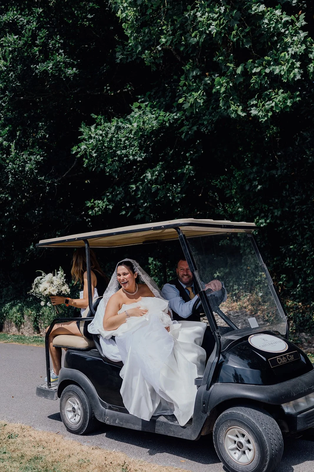 Bride in a golf buggy at Castlemartyr Resort