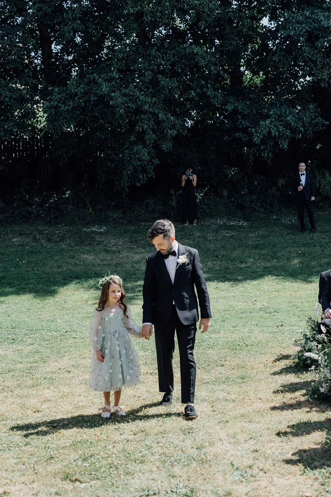 Groom walking up aisle at ceremony at Castlemartyr Resort