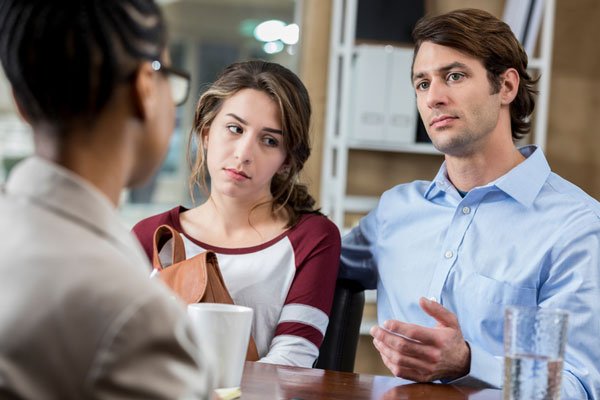 A tense parent teacher manifestation determination review meeting