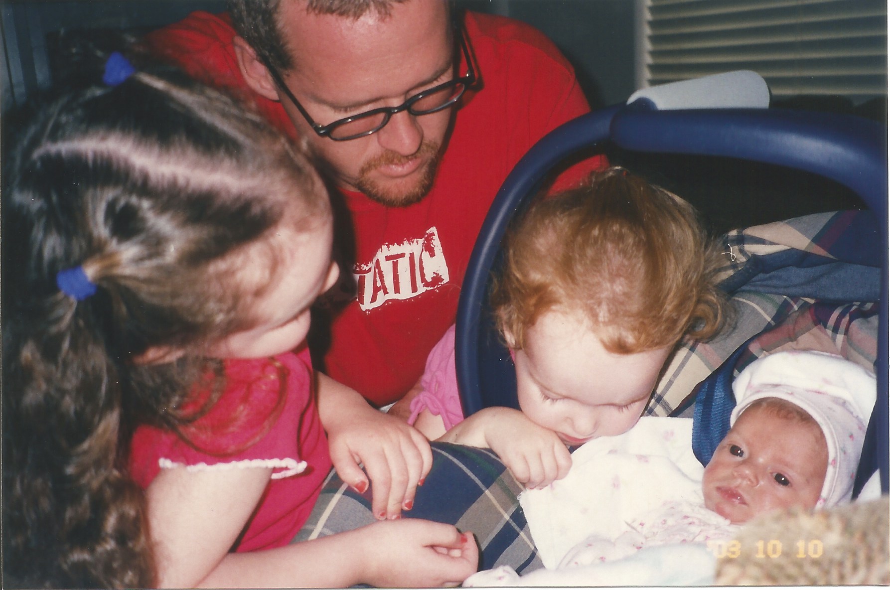 Sisters, Kylie and Christian welcome Kenedee home from the hospital.