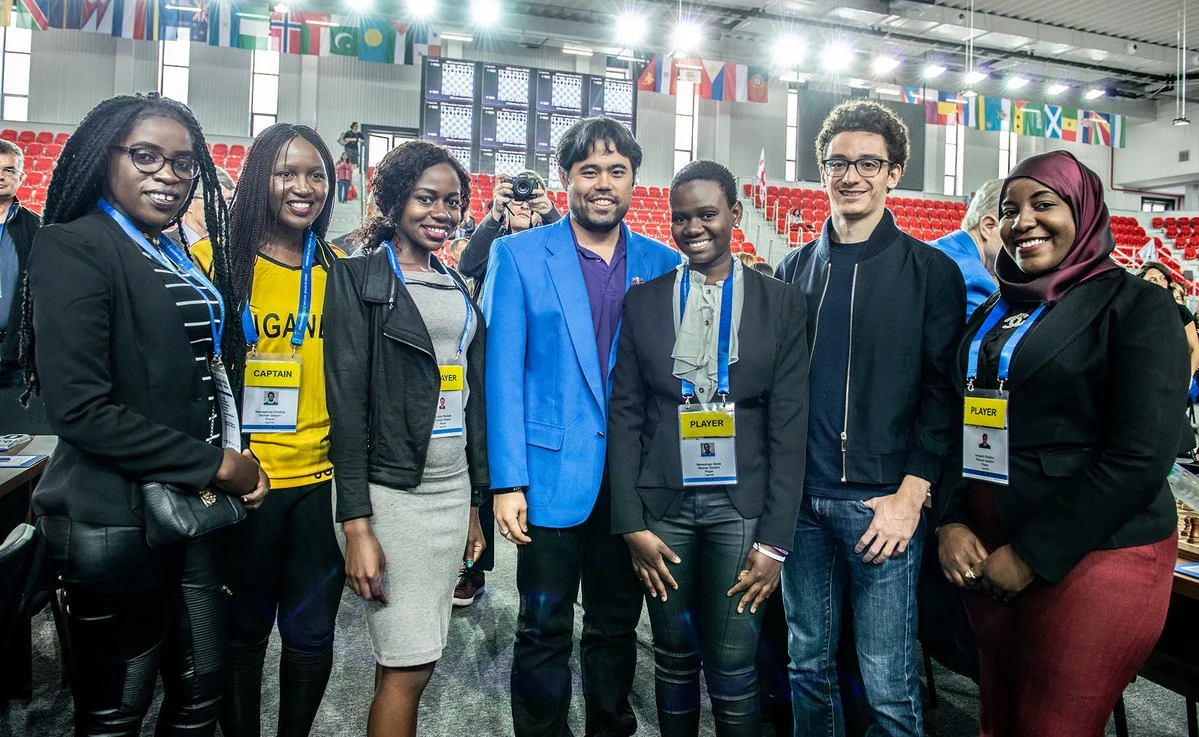 Team Uganda with US Grandmasters Hikaru Nakamura and Fabiano Caruana