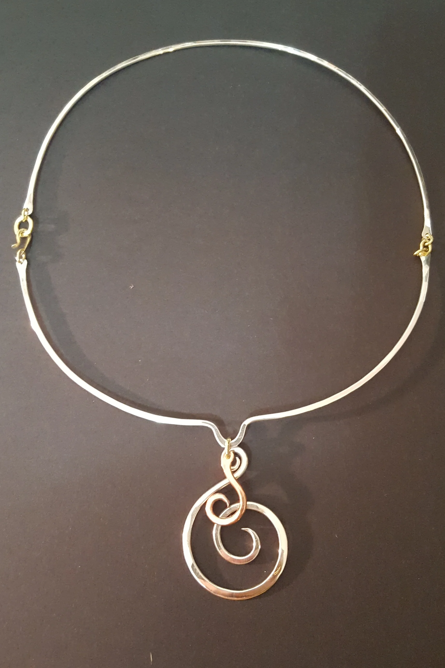 Silver, copper and brass choker and spiral pendant.