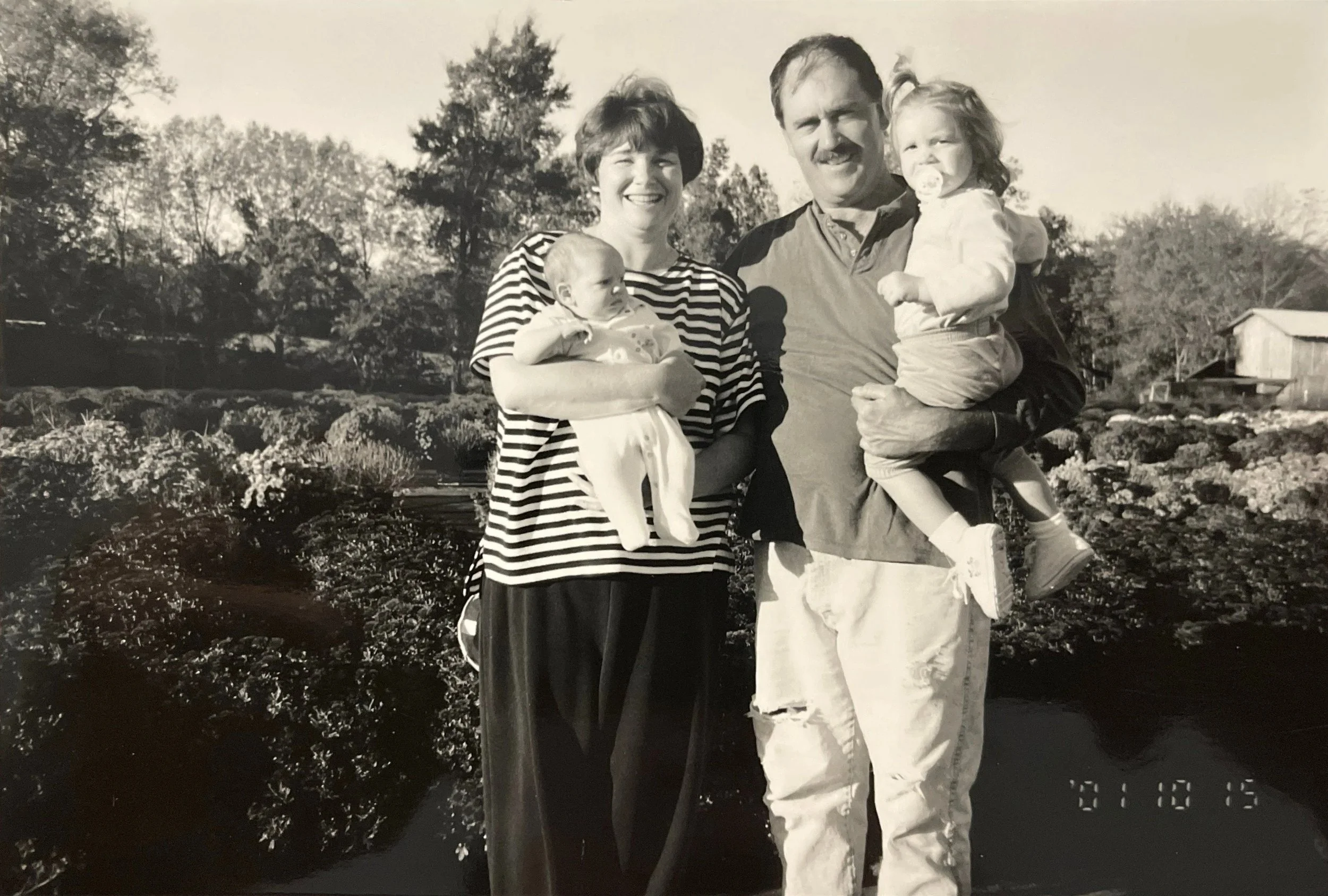 Mrs. Connie and Mr. James with youngest daughter and youngest son (15 October 2001)