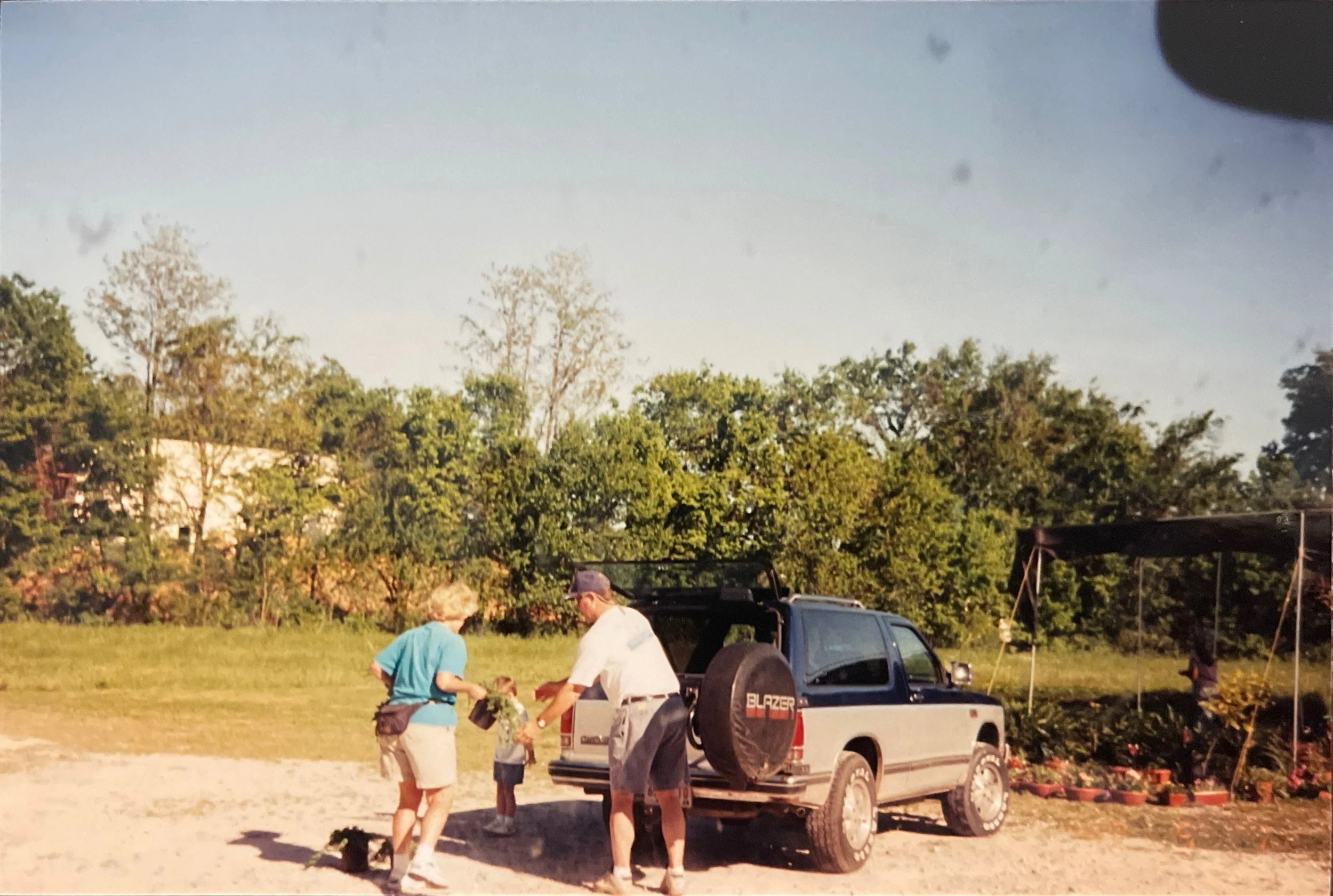 Mrs. Sue (Connie's mother) with customer and oldest grandson (c. 1996)