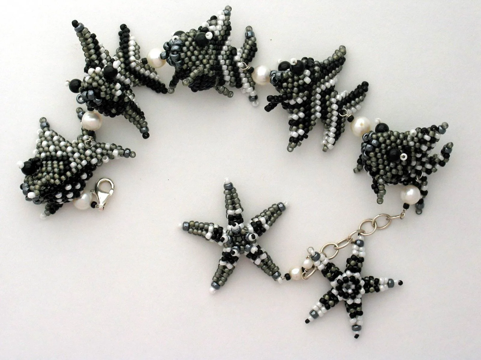 f2 swim around my wrist black and white.JPG