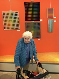 Tony Kormos with her work at the NEWS Special Exhibit: Passion for Weaving Three Master Weavers of Rhode Island 